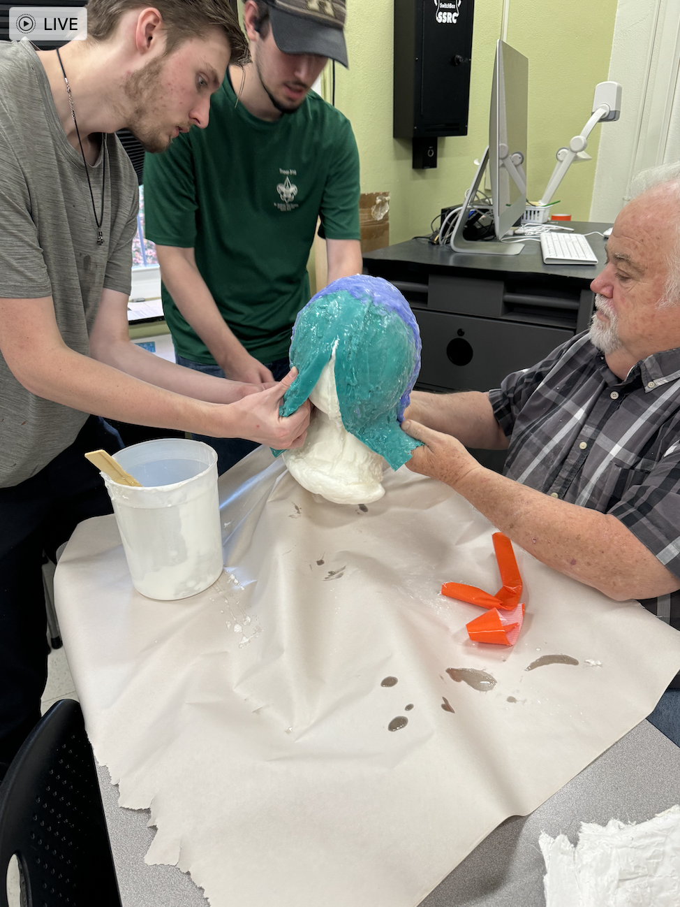 Talking the foam head out of the mold.