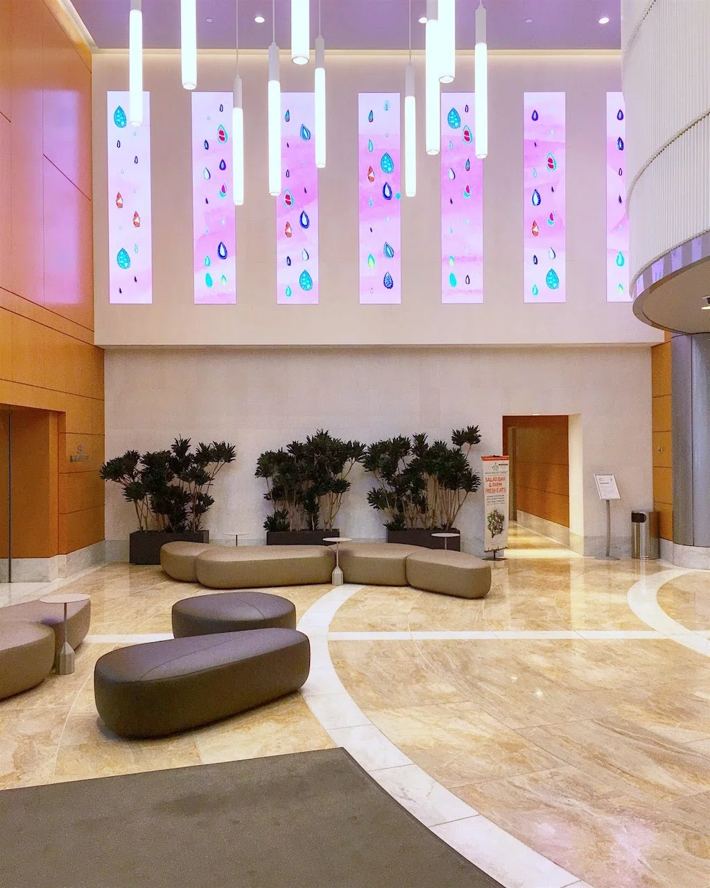 Digital art installation based on original paintings by Melanie Biehle, commissioned by Digital Kitchen and displayed in a Seattle building lobby