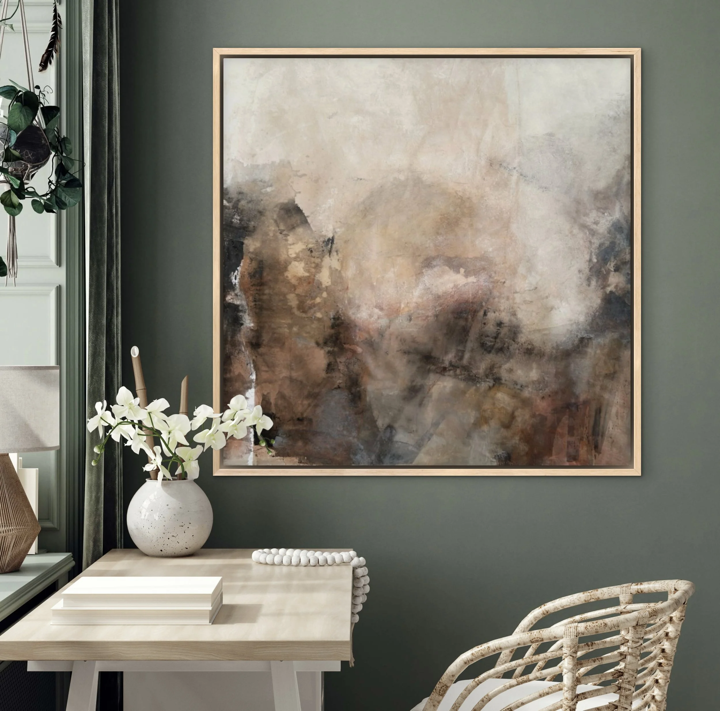 Inner Compass abstract artwork styled above a desk in a muted green interior
