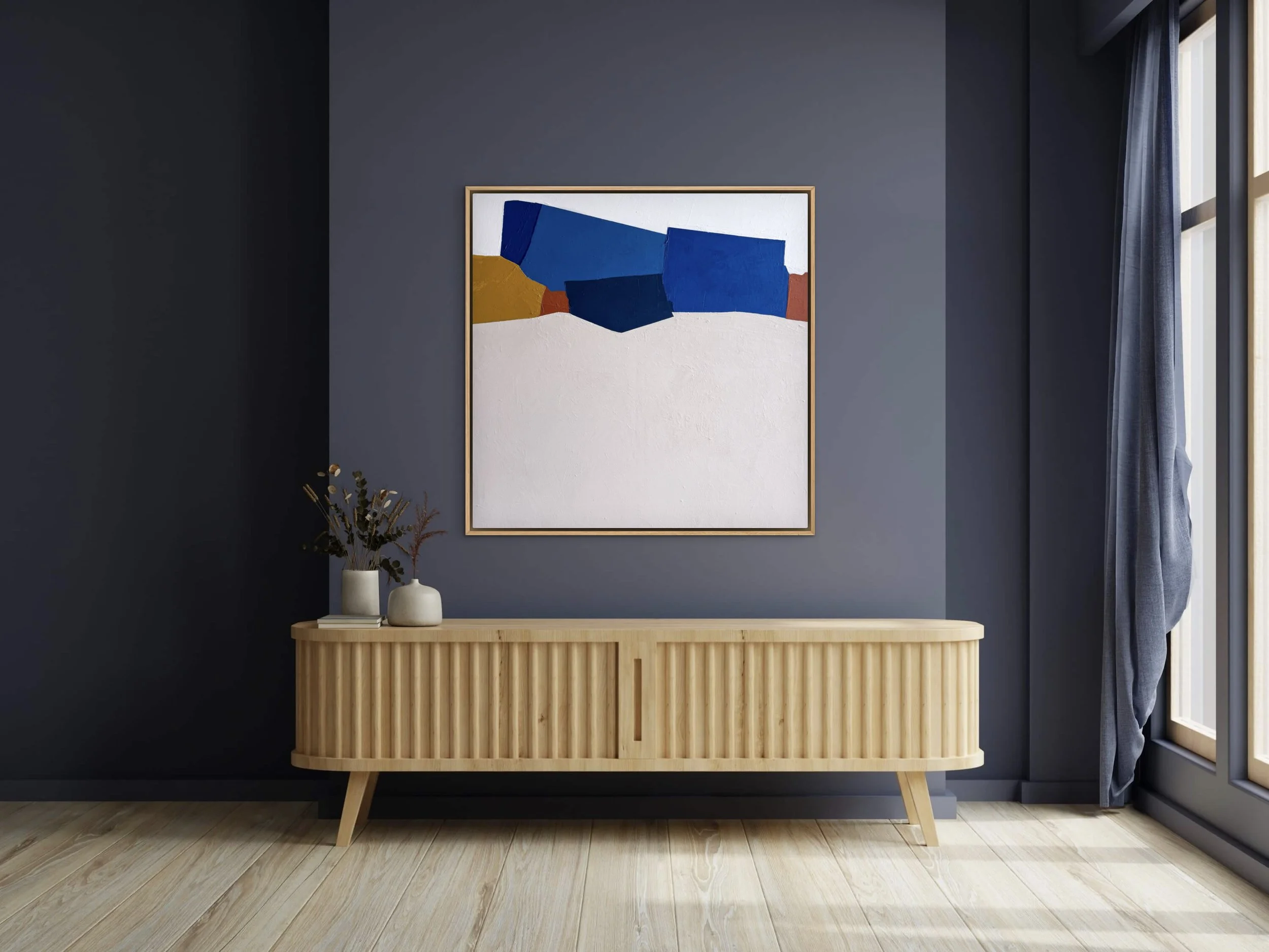 Abstract painting "Waking Up" by Melanie Biehle staged above a console table in a dark blue modern interior