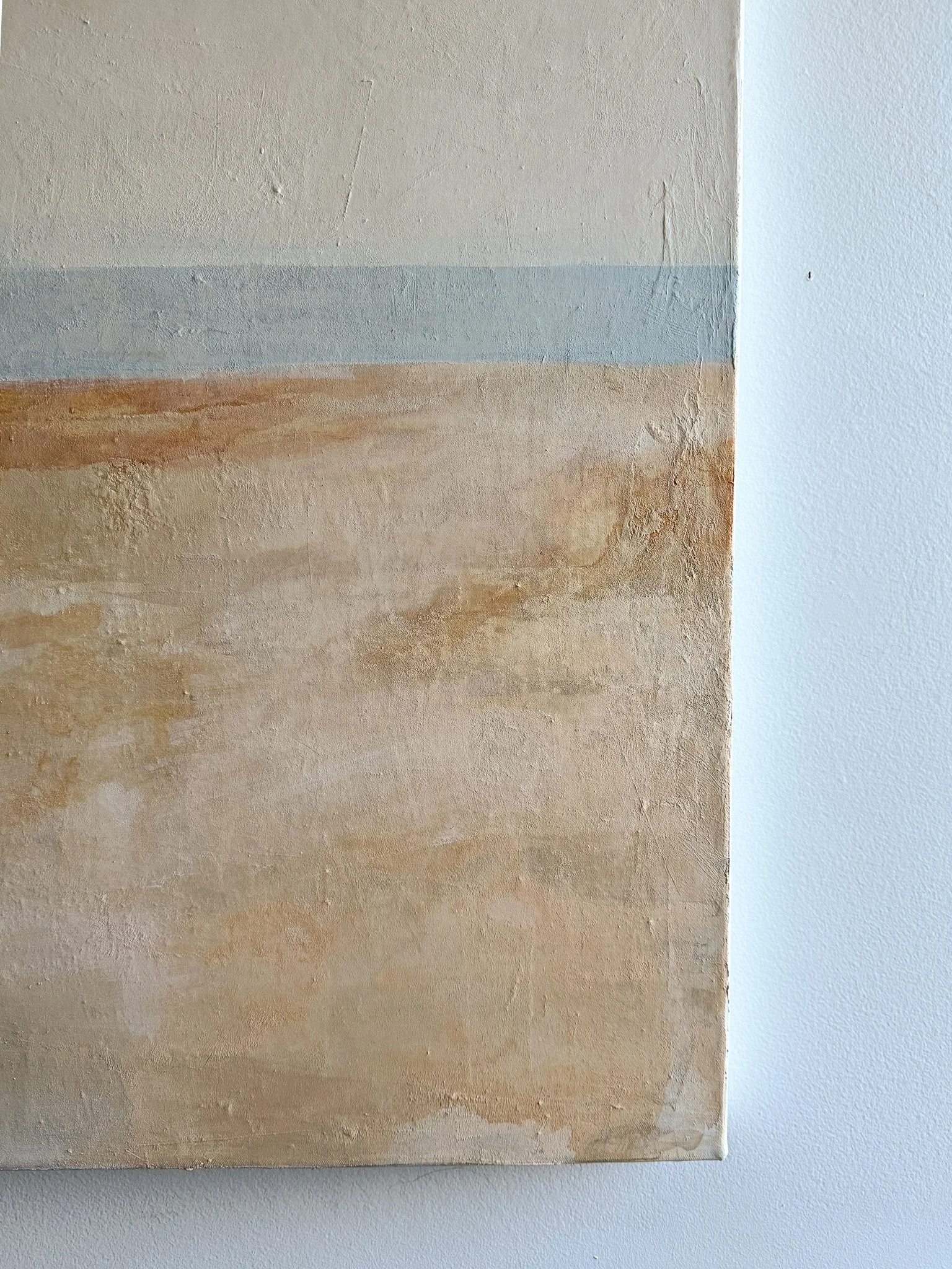 Detail of The Day We Met showing layered paint, soft movement, and coastal color palette
