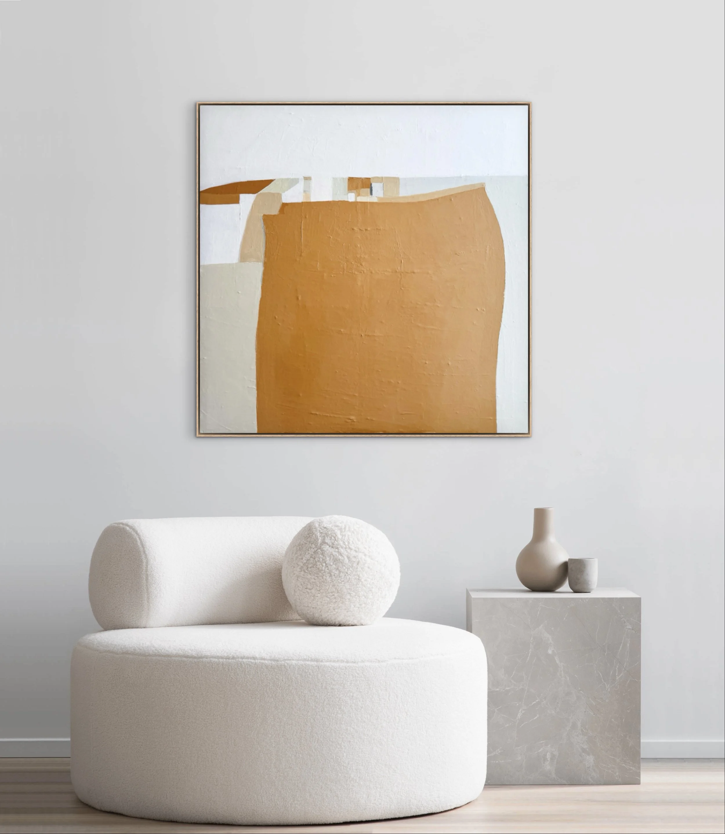 A minimalist living area with a serene ambiance, highlighted by the Spaciousness of Time painting on the wall.