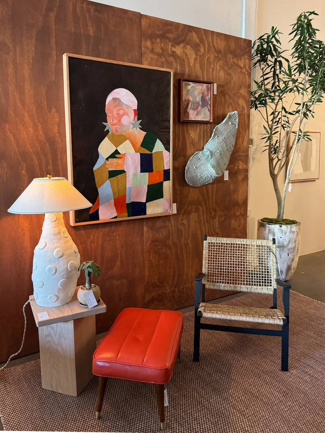 Large painting and lamp by tidy totes at The Living Room pop-up event in SoDo, Seattle.