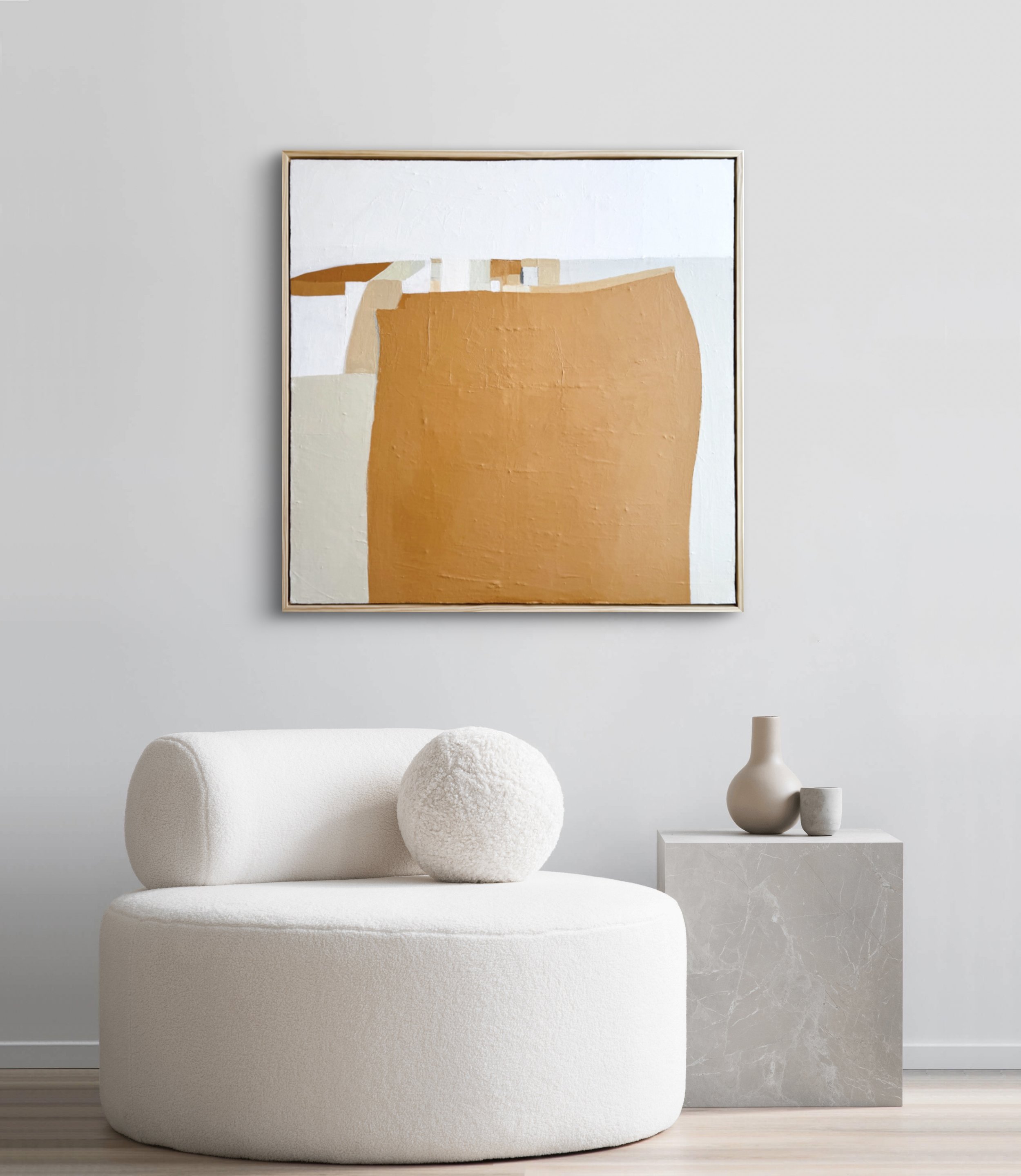 A minimalist living area with a serene ambiance, highlighted by the Spaciousness of Time painting on the wall.