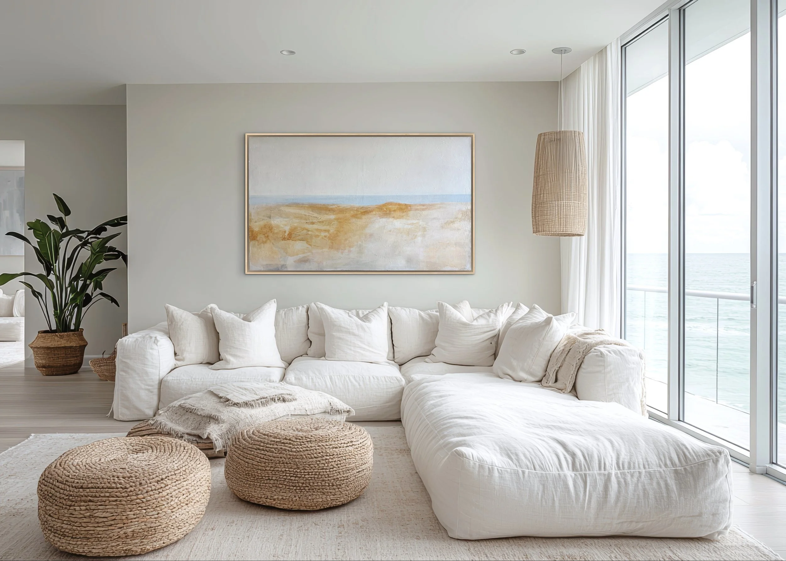 The Day We Met abstract seascape painting displayed above a sofa in a modern living space