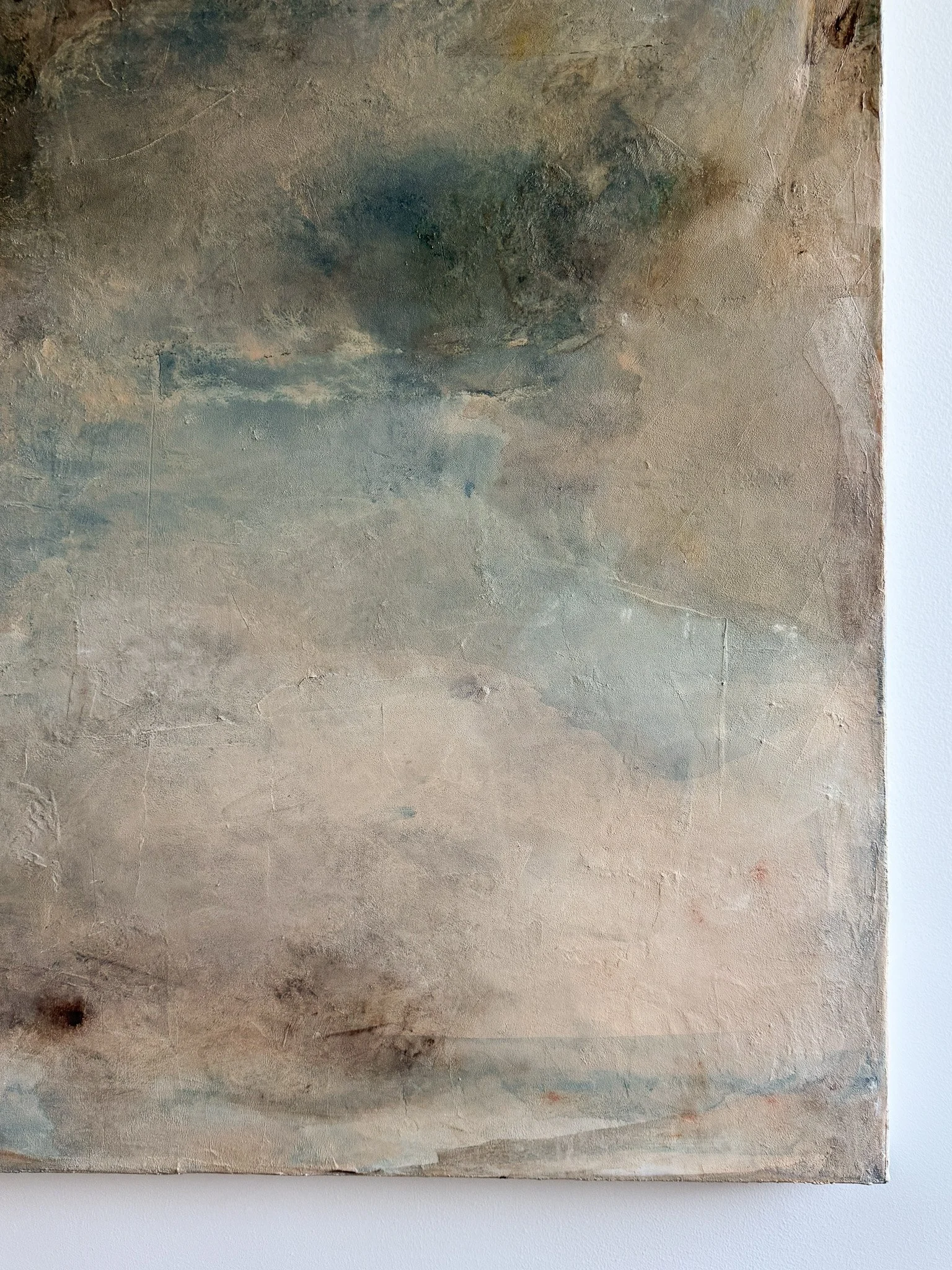 Detail of Wayfinder showing layered brushwork, weathered texture, and soft blue and earth tones