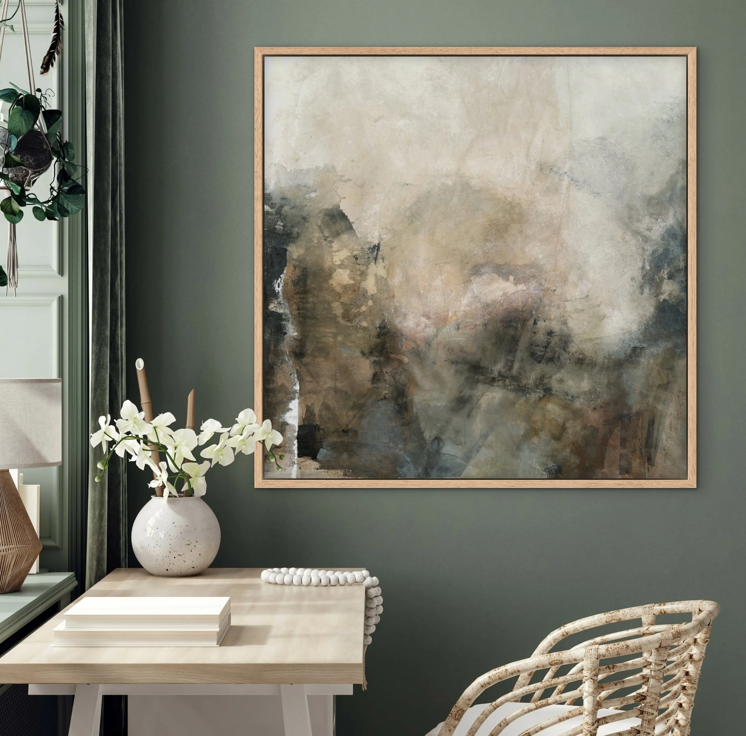 Inner Compass abstract artwork styled above a desk in a muted green interior