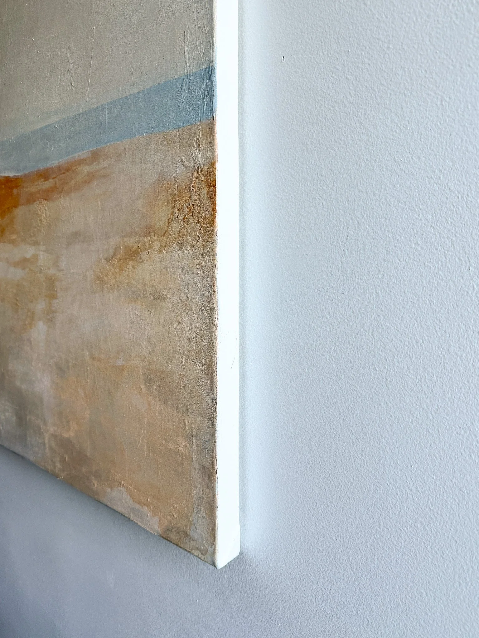 Side detail of The Day We Met showing layered paint and coastal color palette
