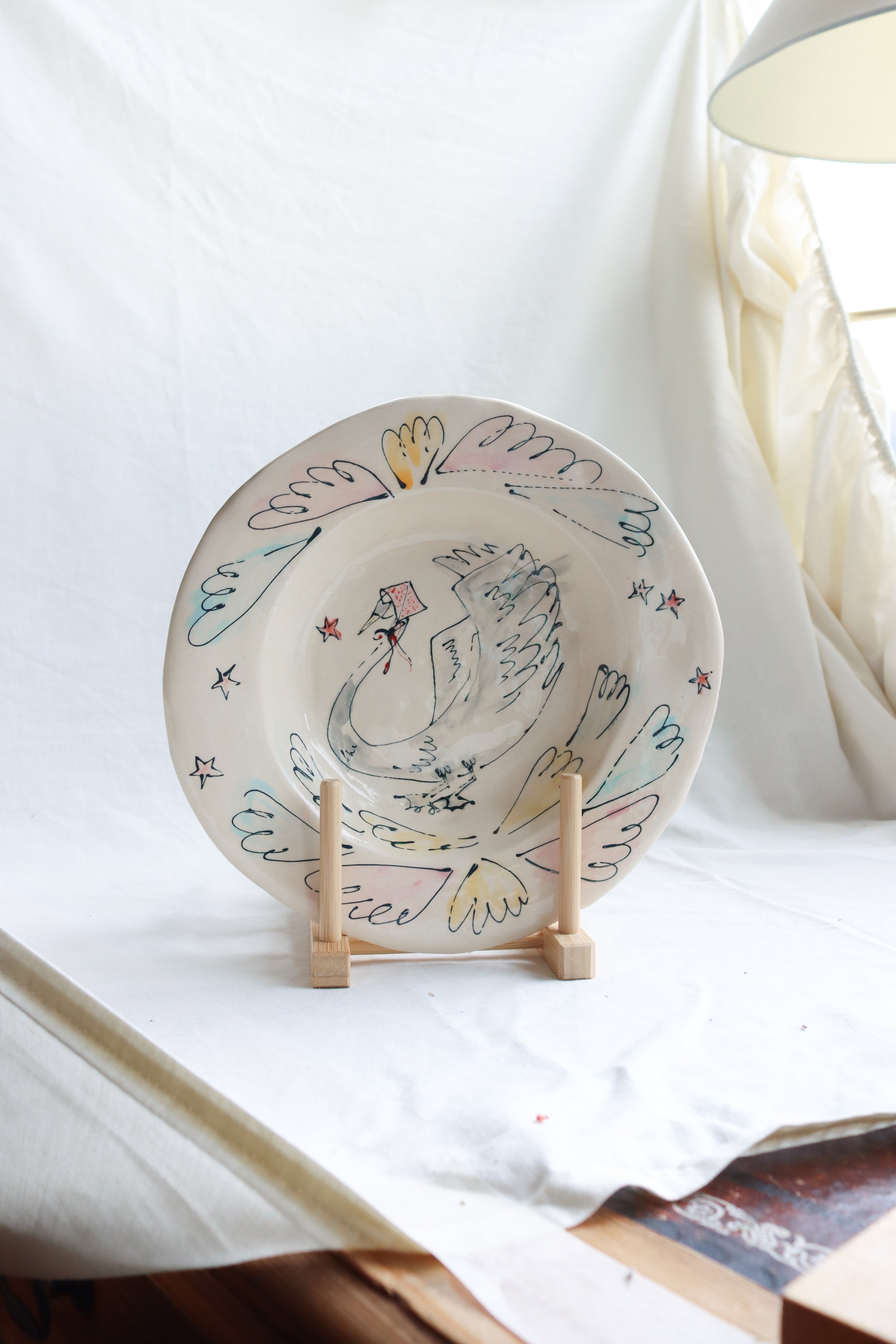 SWAN IN A RAINHAT Decorative Plate