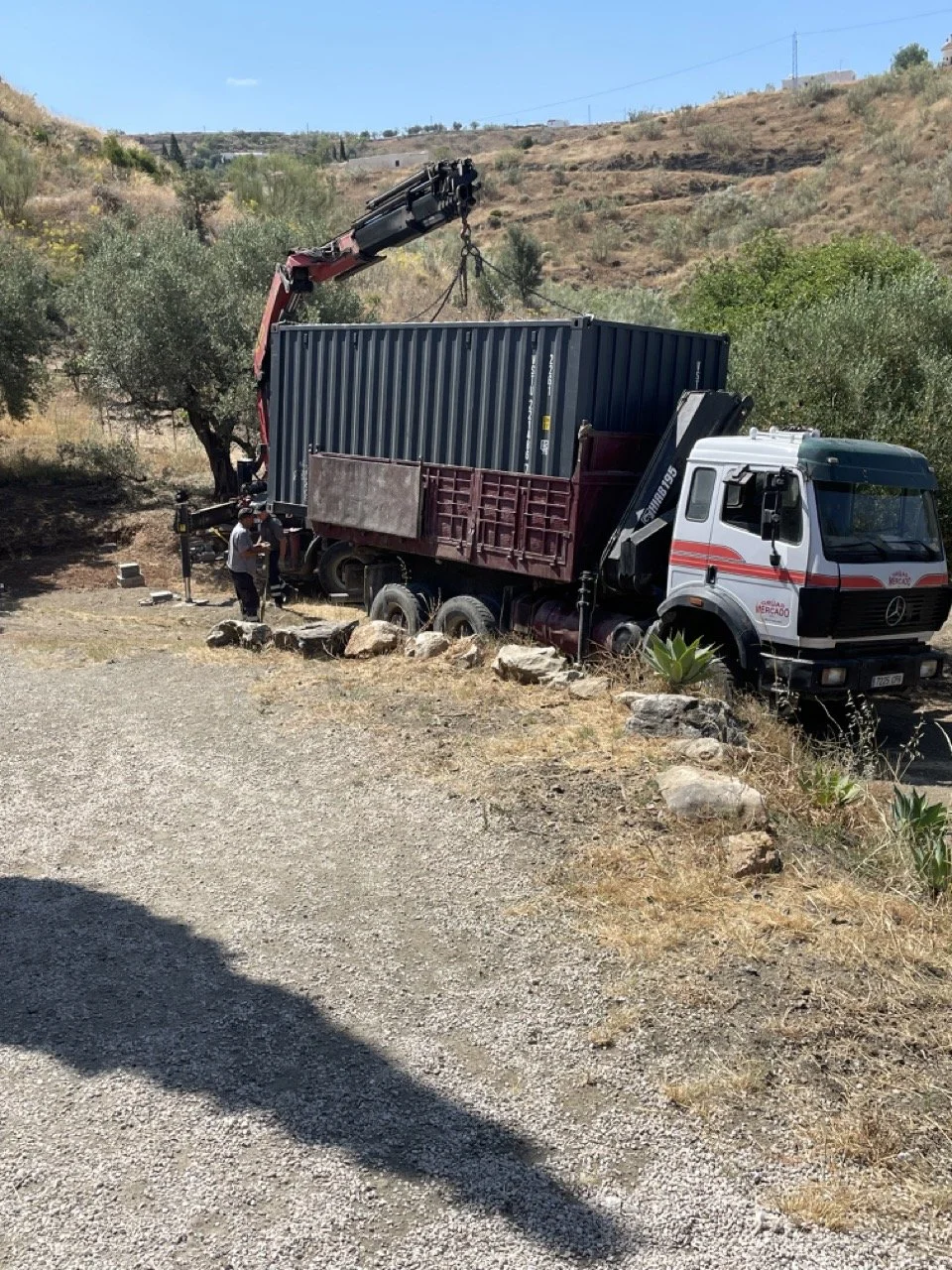 TinyTaller_placing _container_in_garden.jpeg