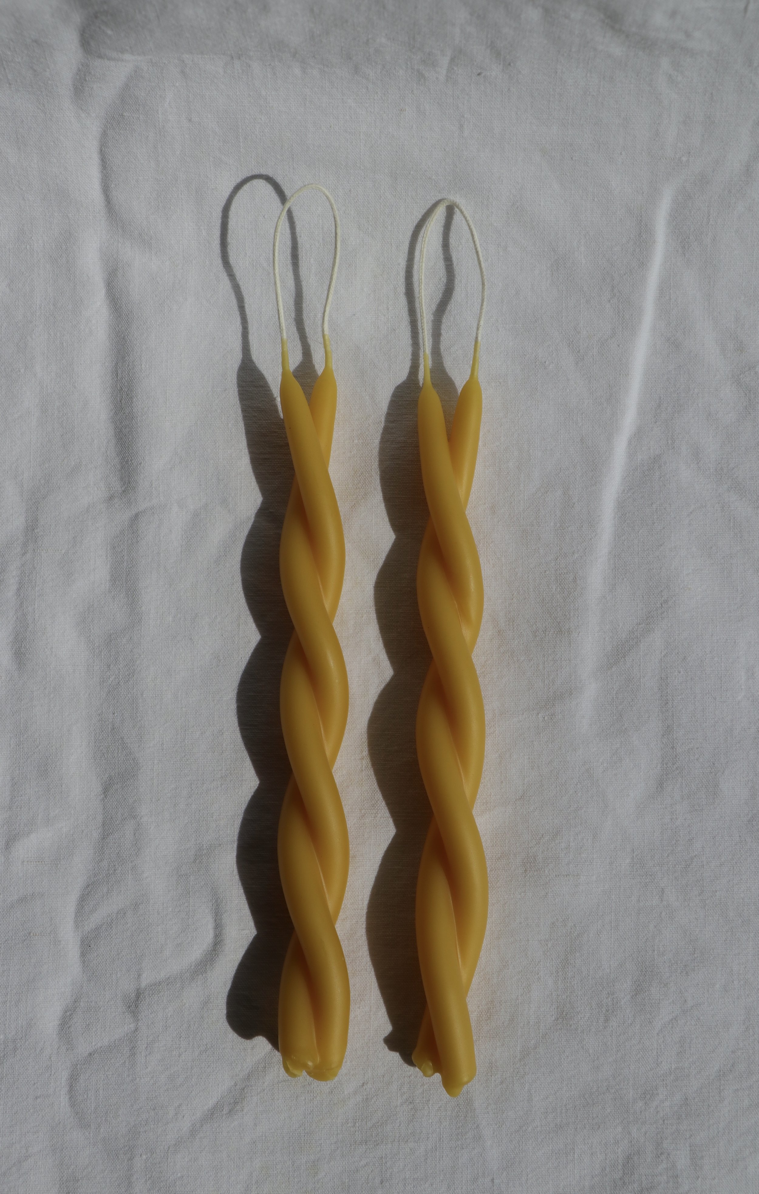 yellow pure beeswax twin flame candles .jpg