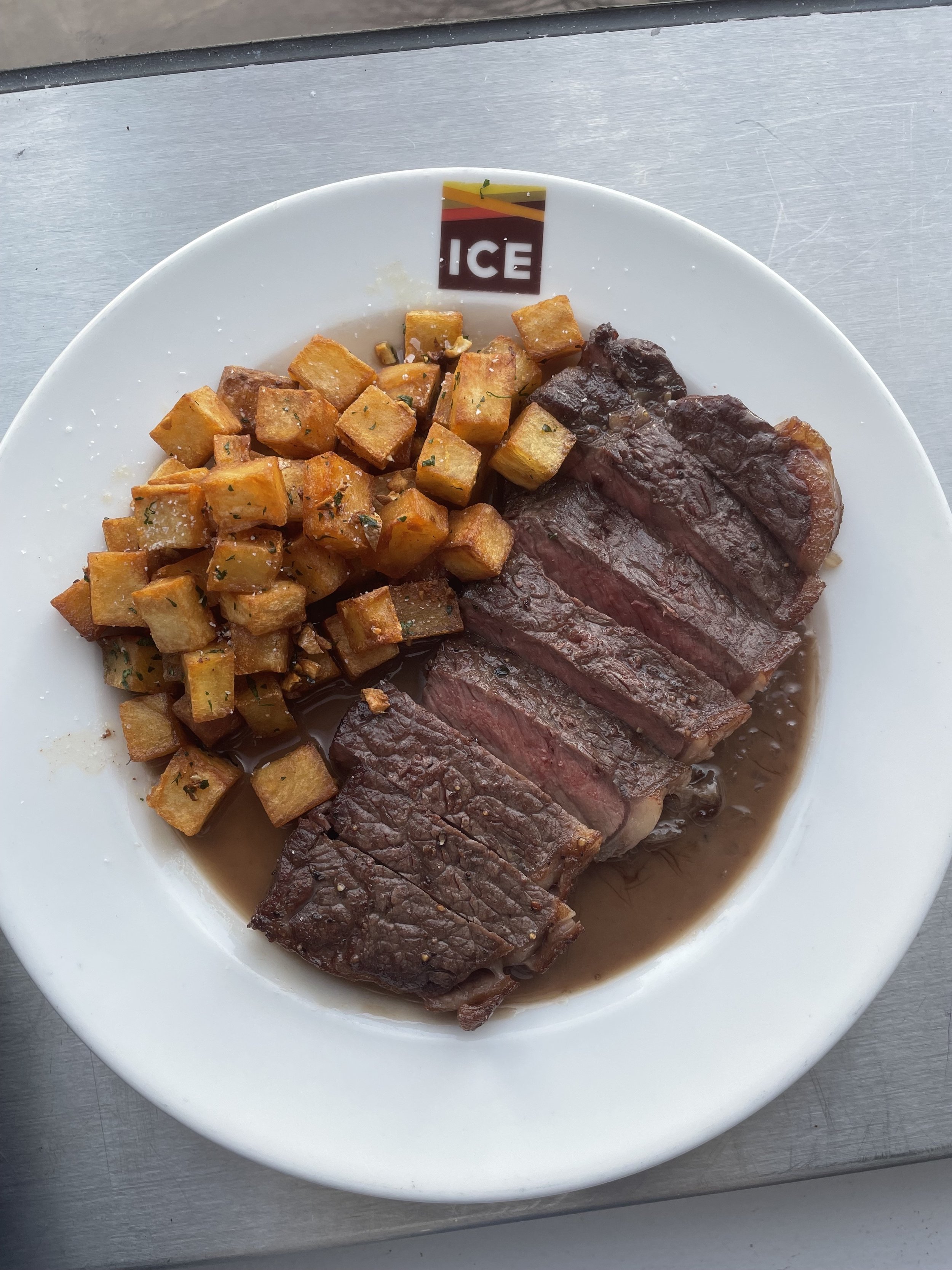 Seared Strip Steak with Pan Fried Potatoes and Red Wine Pan Sauce
