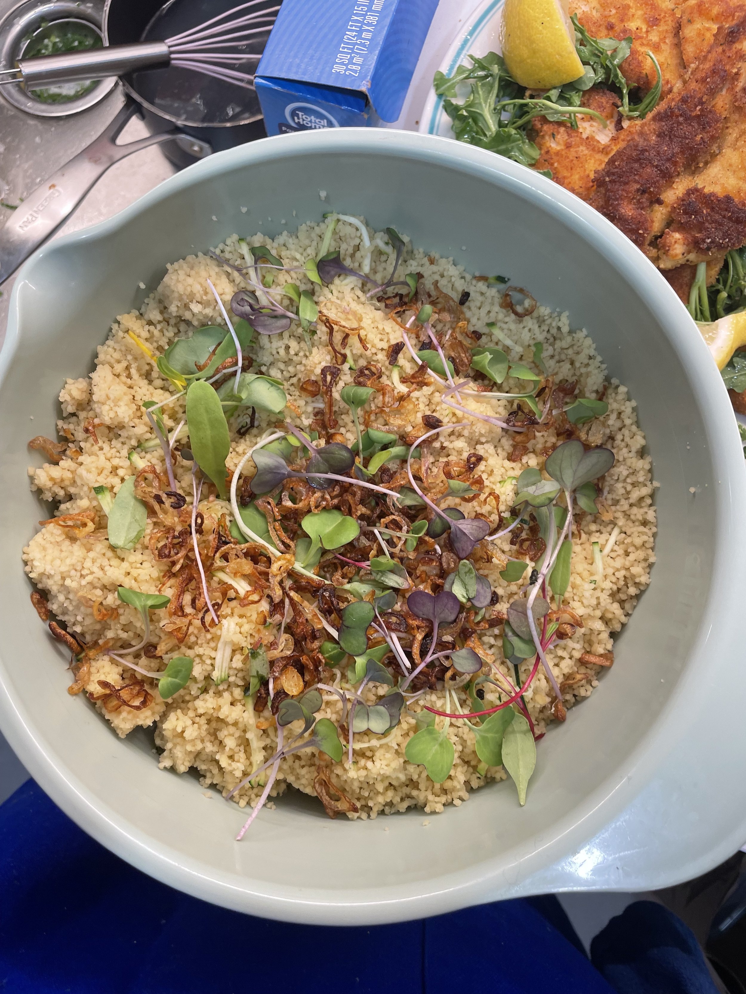 Couscous topped with Crispy Shallots and Micro Greens