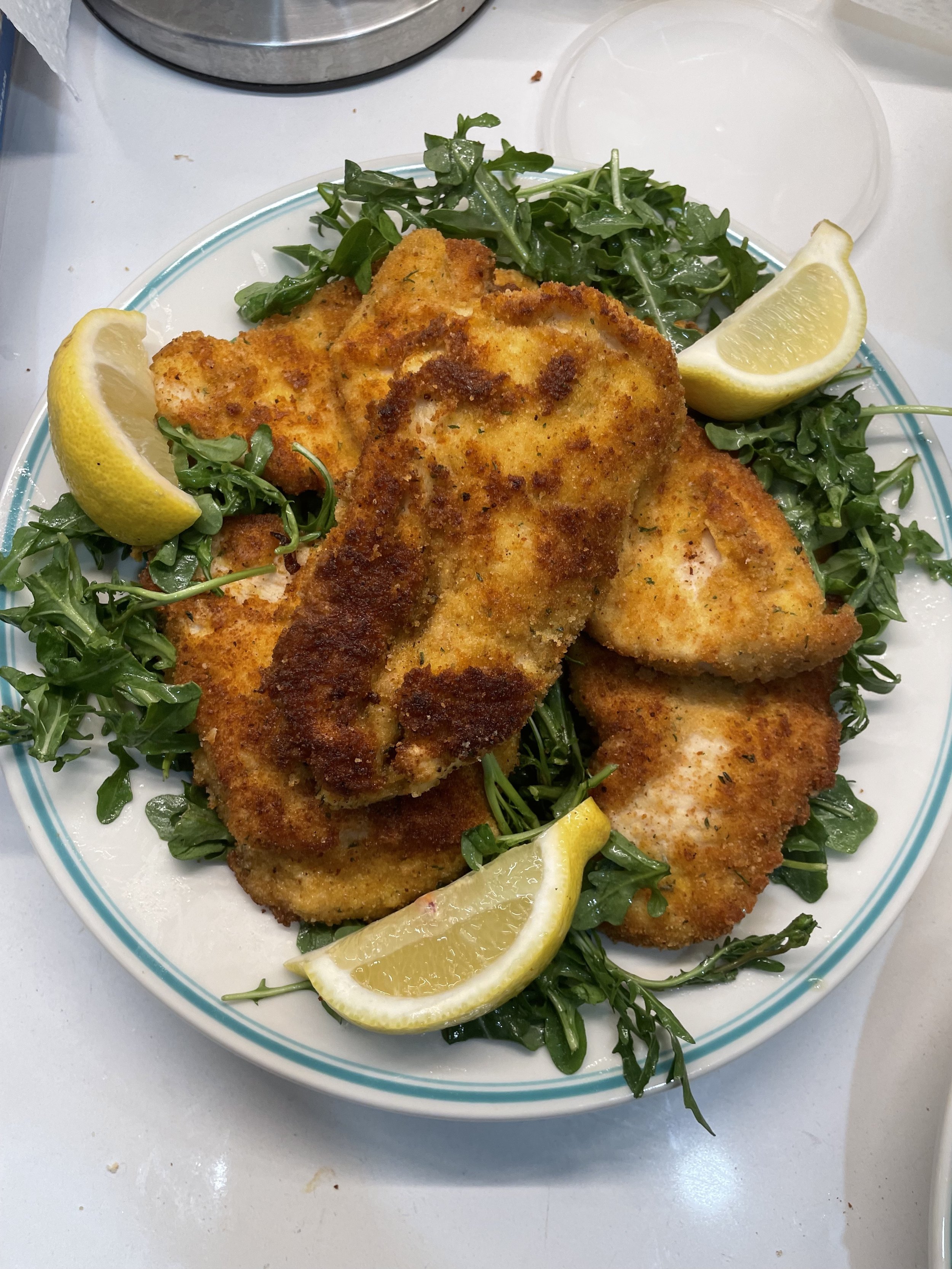 Chicken Cutlets over Arugula Salad