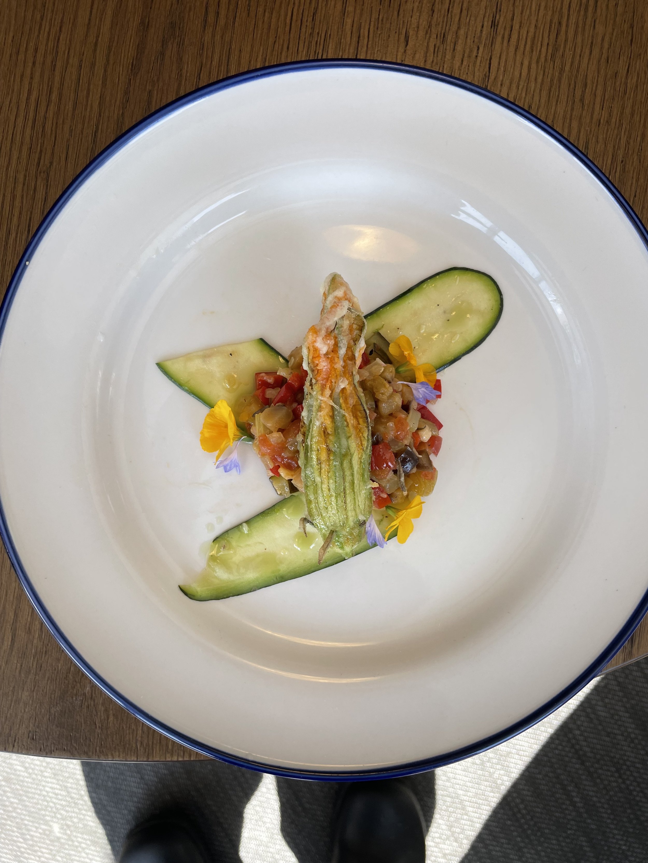 Fried Squash Blossom over Roasted Veggies and Sliced Zucchini