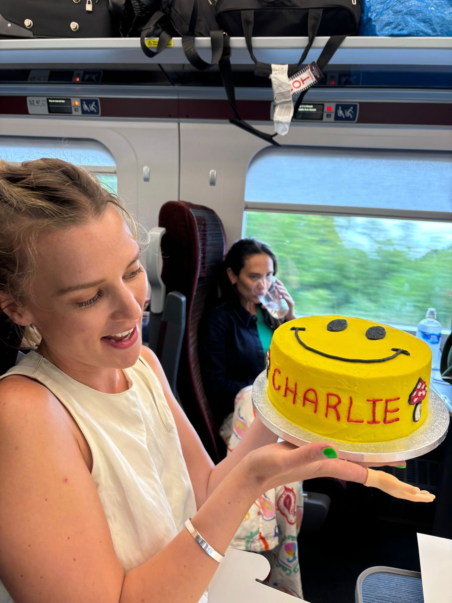 Charlie with her cake on the way up to Lost Village