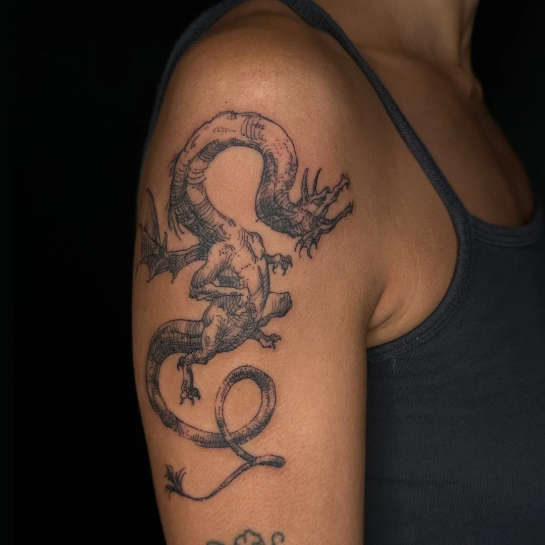 Crosshatching dragon on the shoulder
