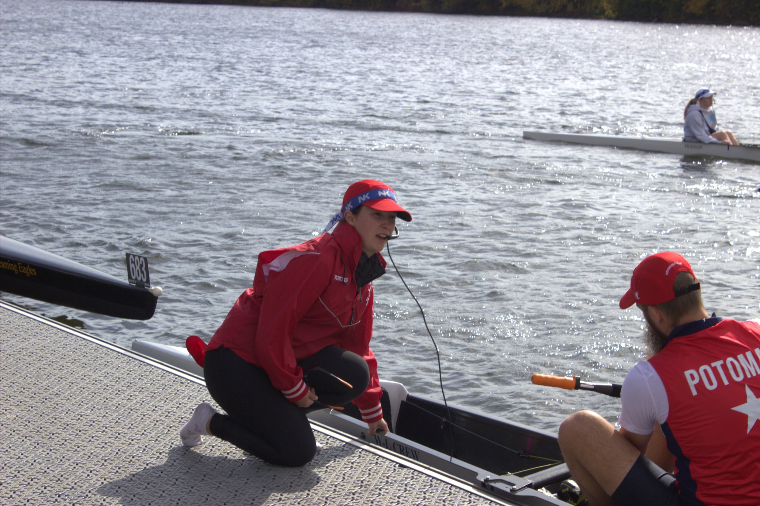 PBC coxswain & rower readying to launch.
