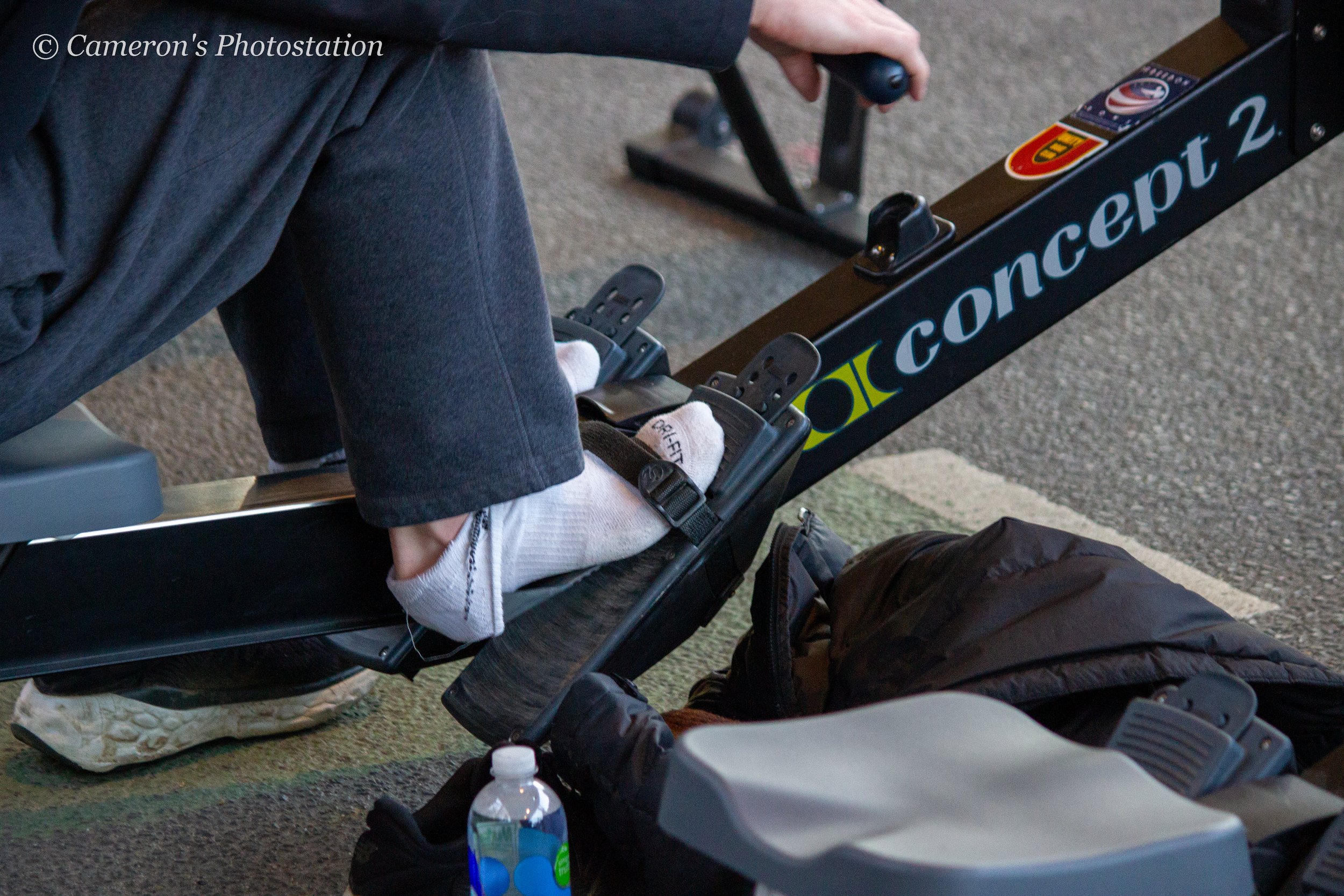 Feet tied into the erg, socks wrapped onto the heel plate.