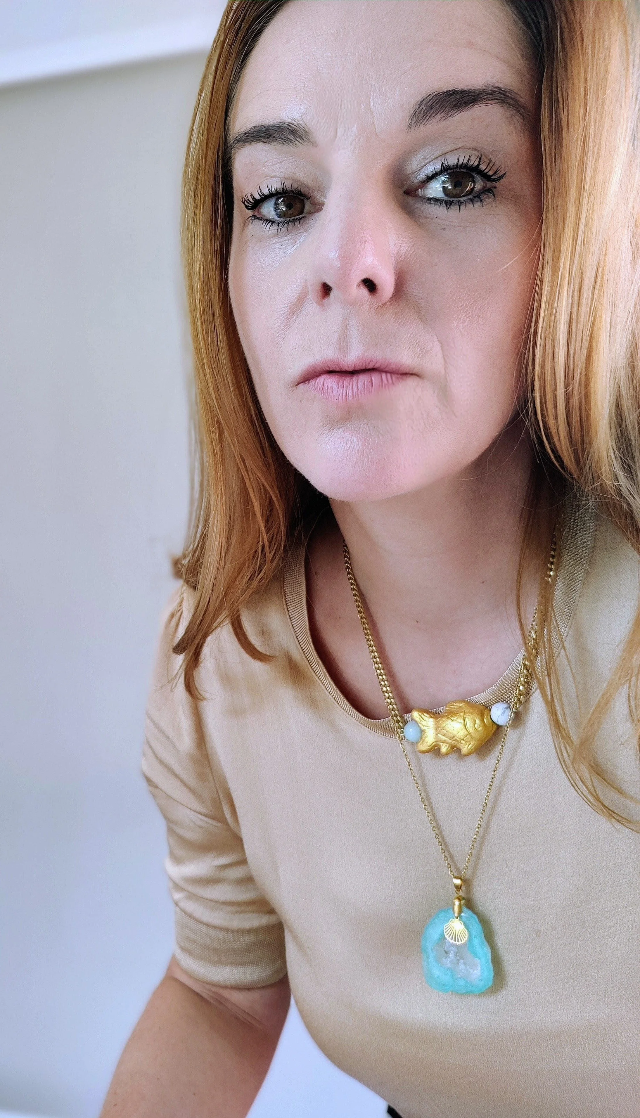 Chunky Gold Chain Fish Necklace on person_layered look.jpeg