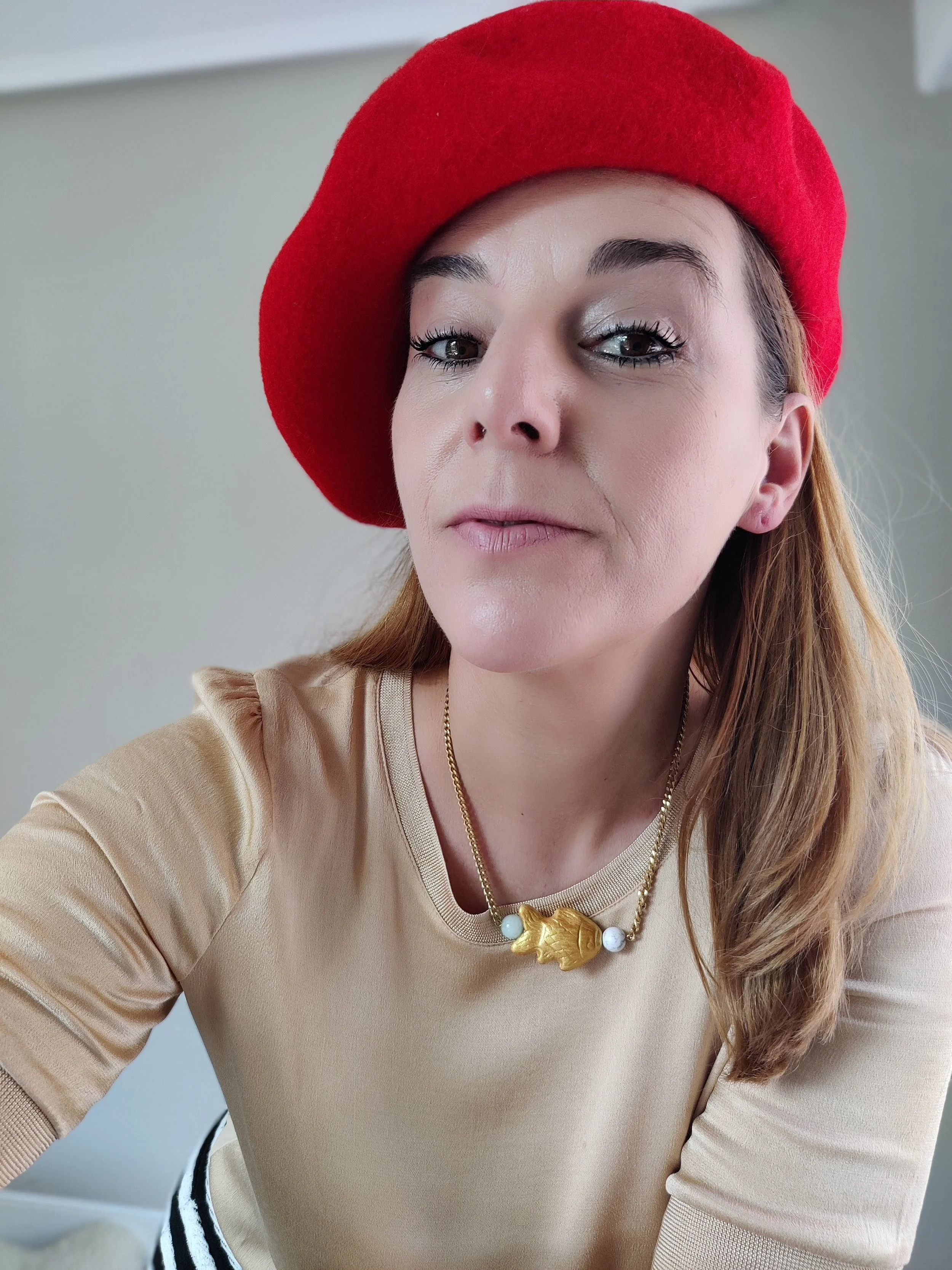 Chunky Gold Chain Fish Necklace on person.jpeg