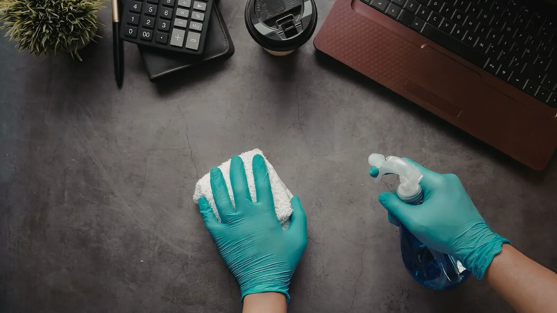 Eco friendly surface cleaning in a commercial workspace using environmentally responsible cleaning products.