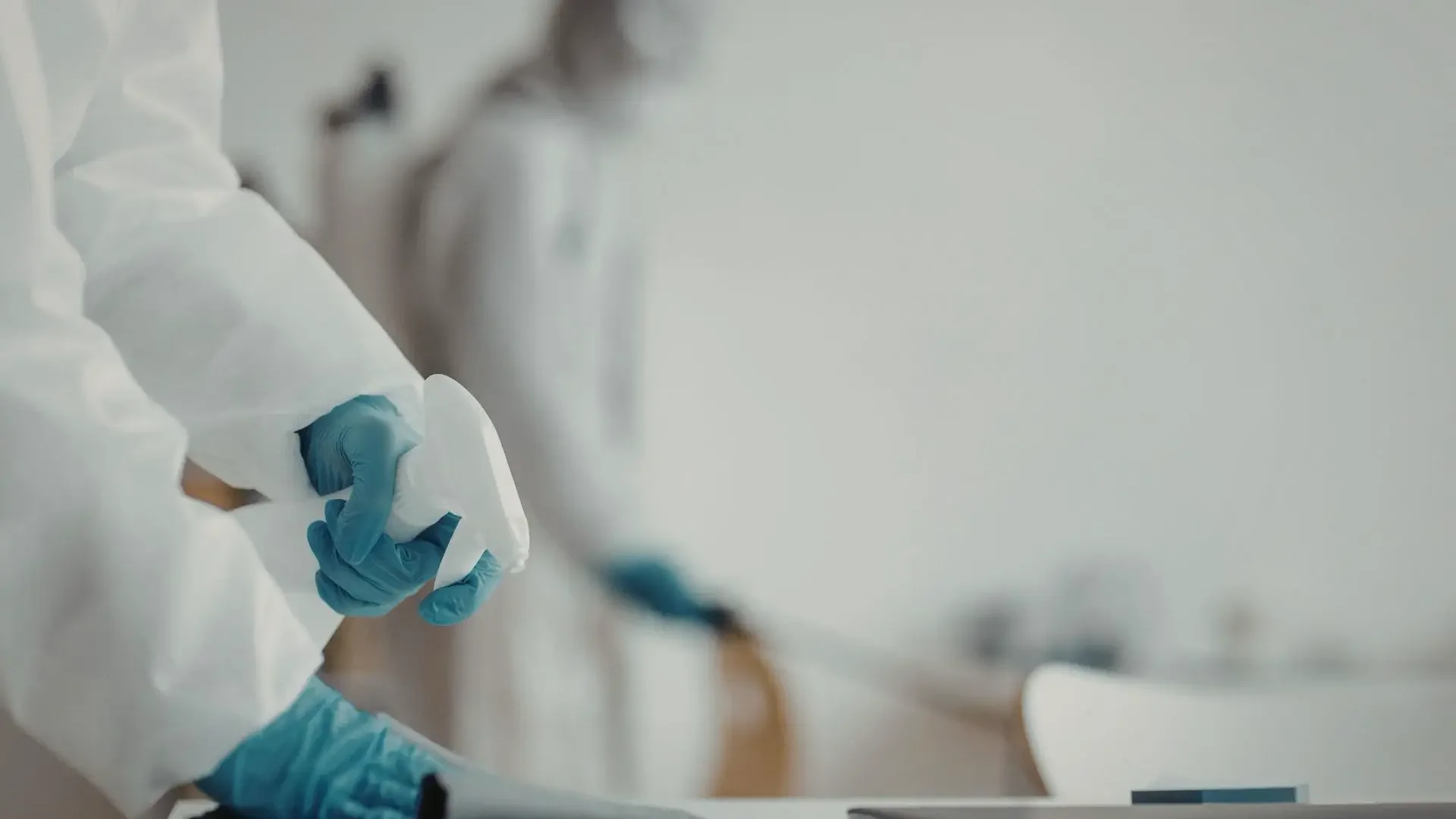 janitorial cleaning team disinfecting shared office equipment in Austin Texas