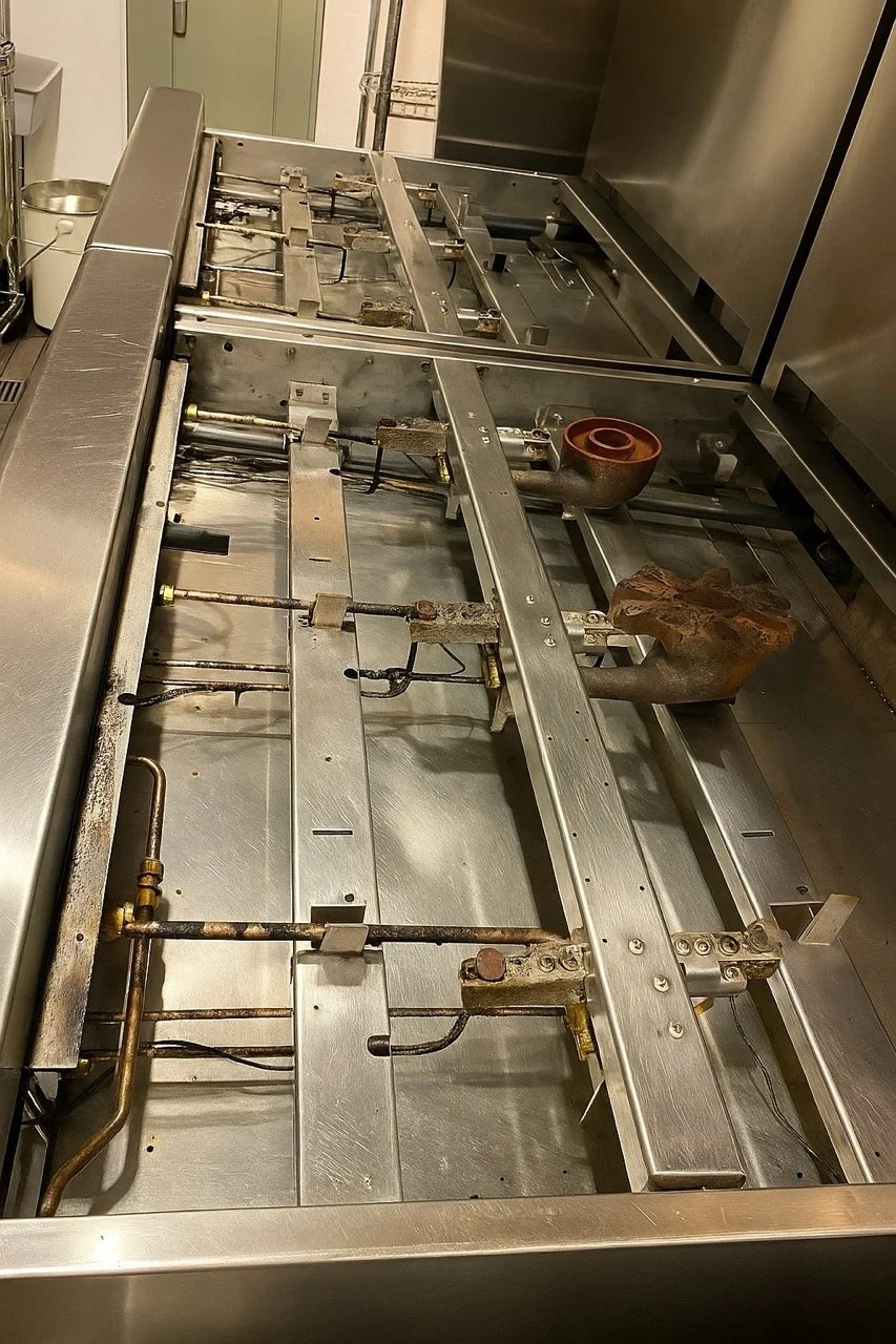 Commercial restaurant stove spotless and sanitized after professional kitchen deep cleaning by OrakPro in Austin.