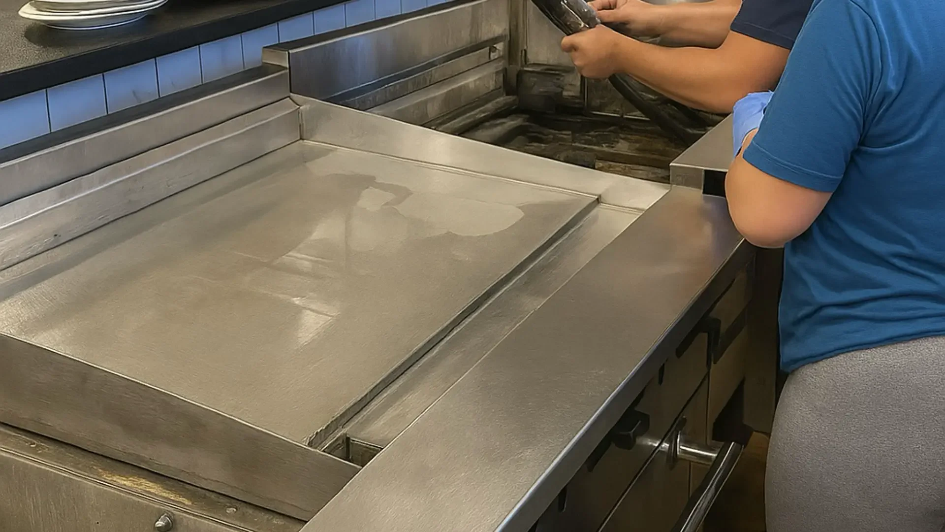 Professional restaurant cleaning support during busy season in Austin, TX with staff maintaining kitchen and dining areas.