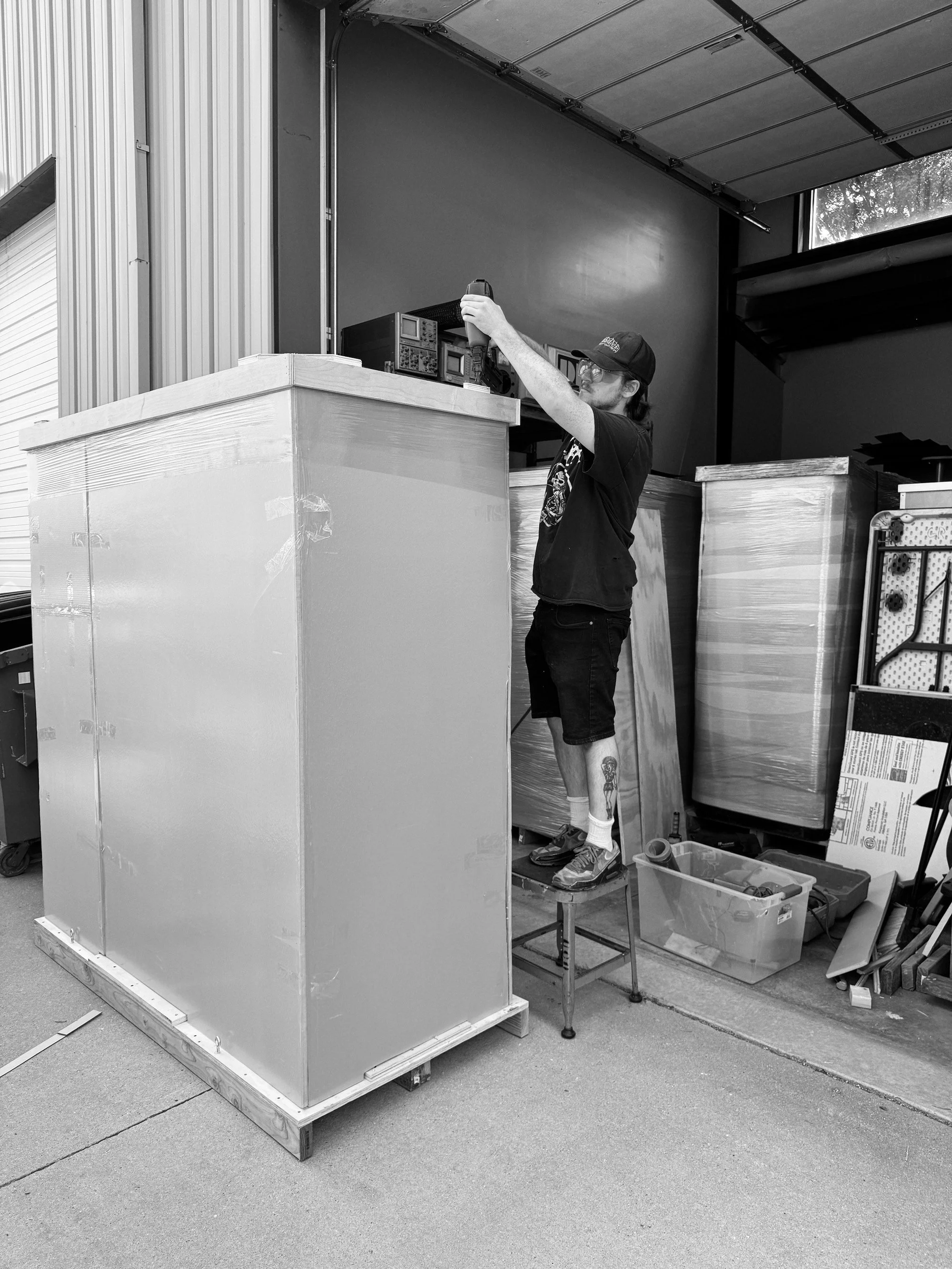 Packaging a vintage photobooth for shipment to California