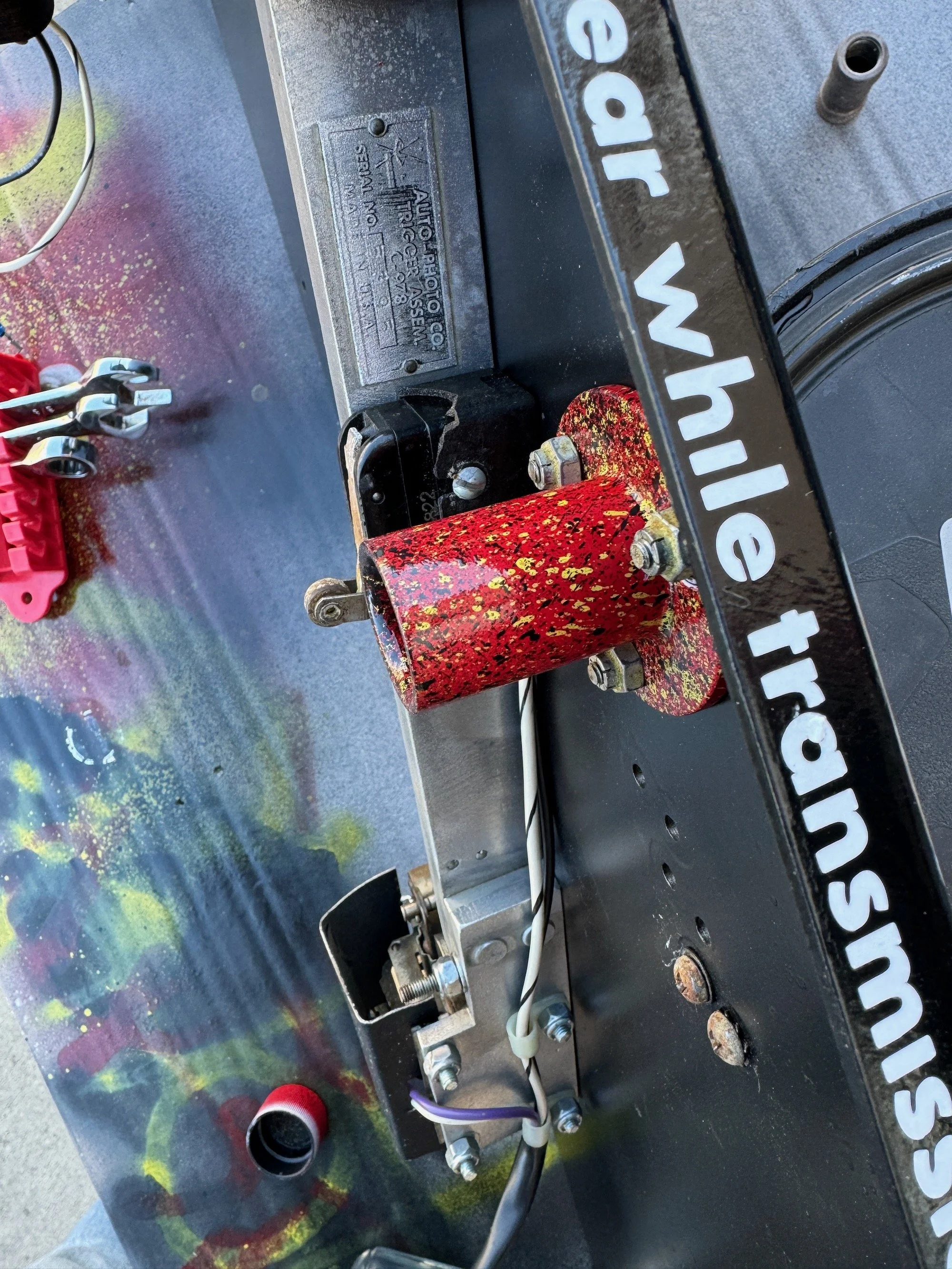 Underside of analog photobooth camera shelf