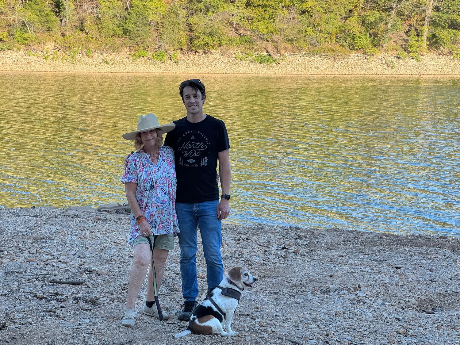 Happy seller of a vintage model 11 photobooth pictured next to a lake in Northwest Arkansas