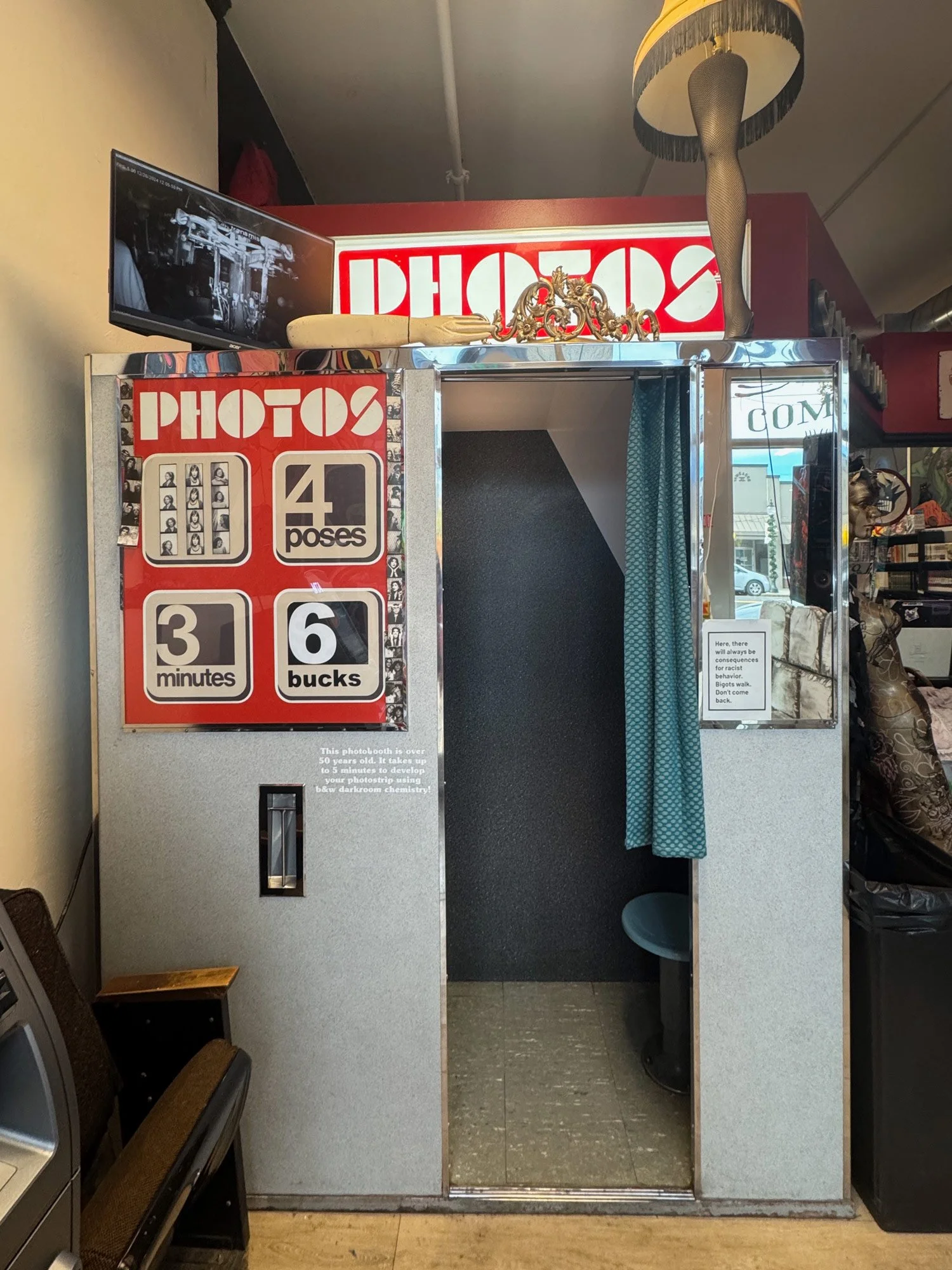 Model 17 vintage photo booth in grey finish with original red signage and red PHOTOS top sign