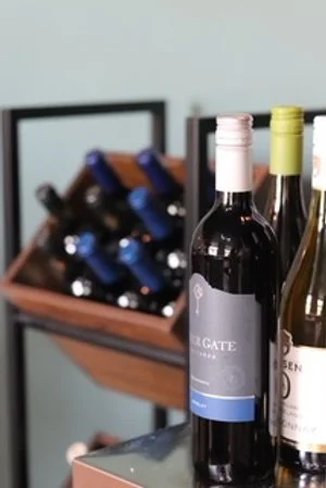 Gallery - Wine bottles in cubbies.JPG