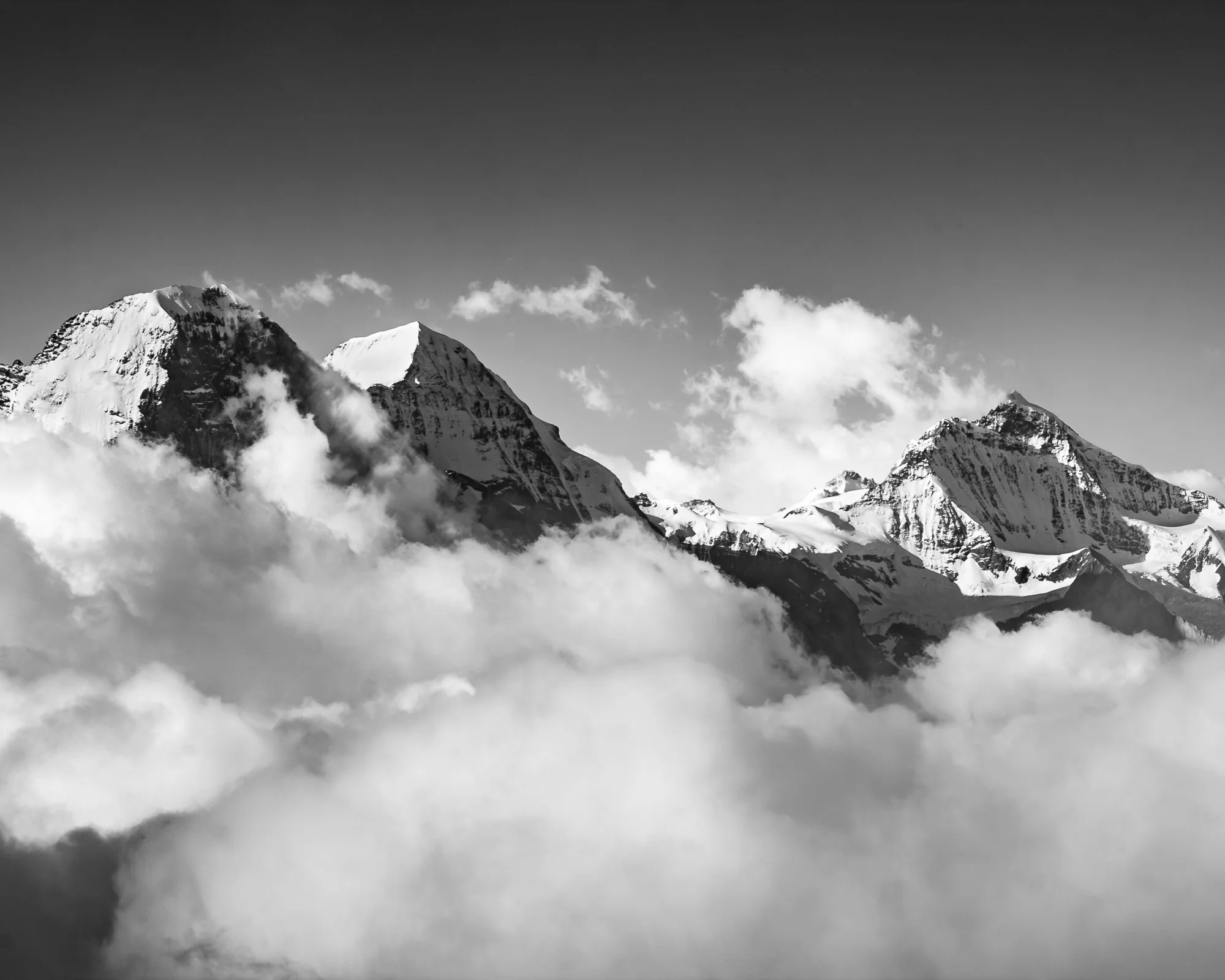Eiger, Monch, Jungfrau emerge from clouds