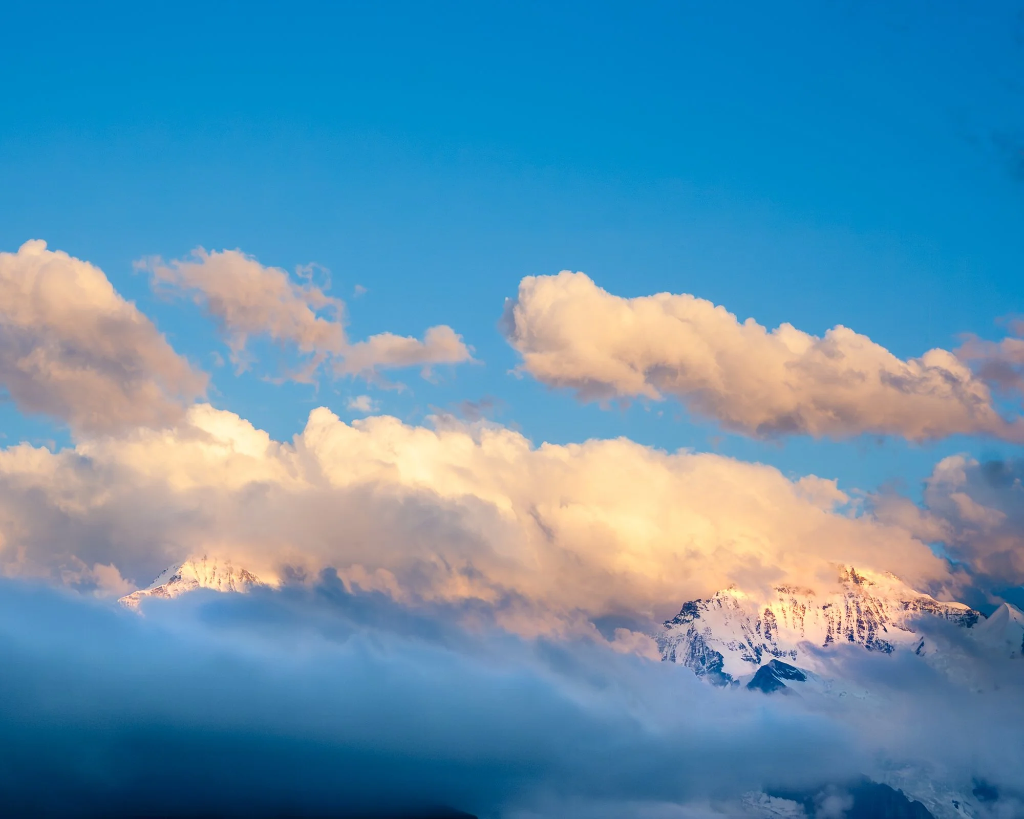 Sunset Clouds obscure Eiger, Monch, Jungfrau