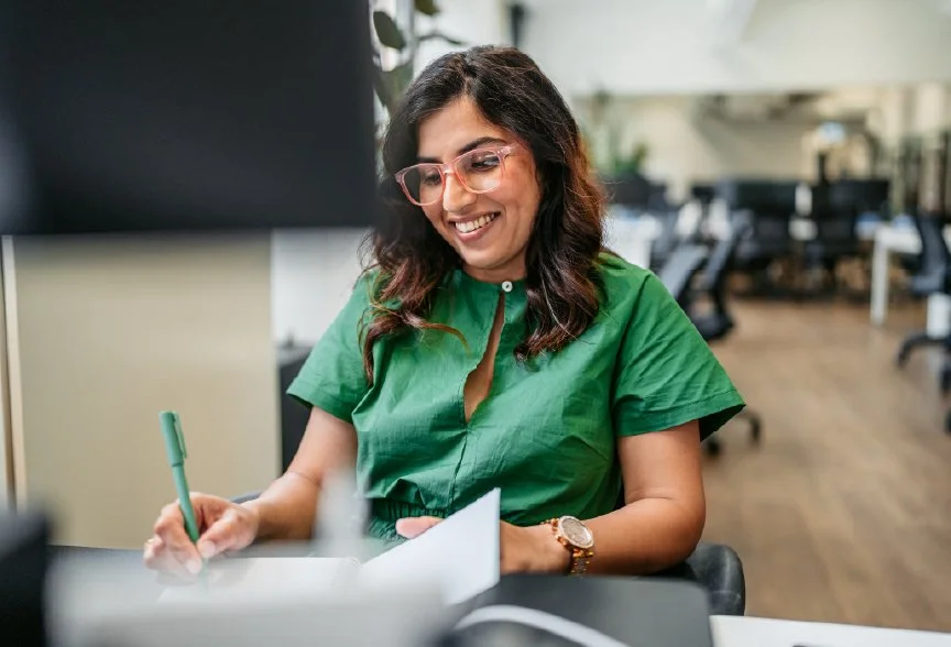 Business woman taking notes