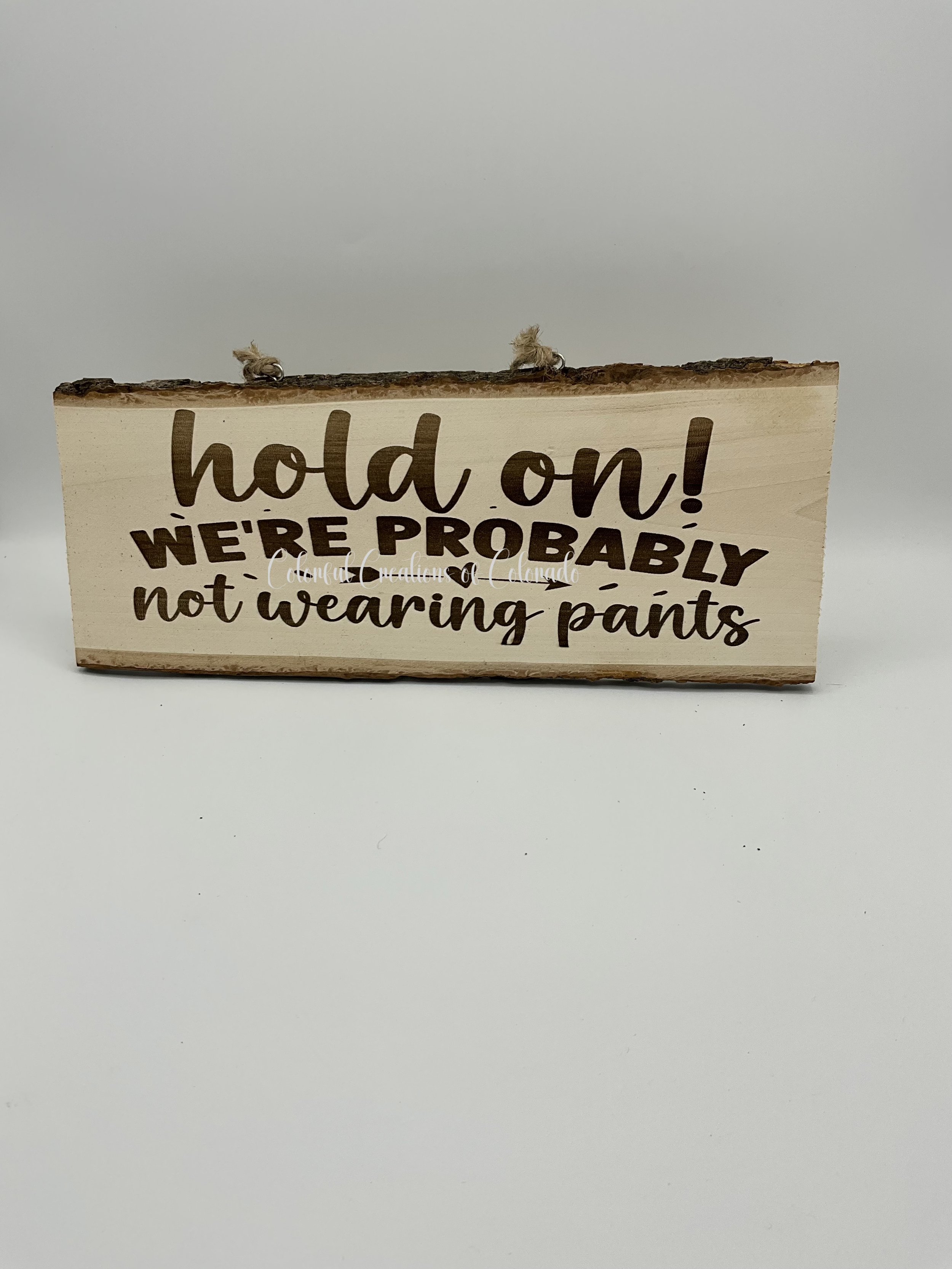 LESign_HoldOnPants.jpeg