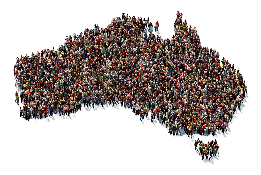 Crowd of diverse people forming the shape of the state of Massachusetts.
