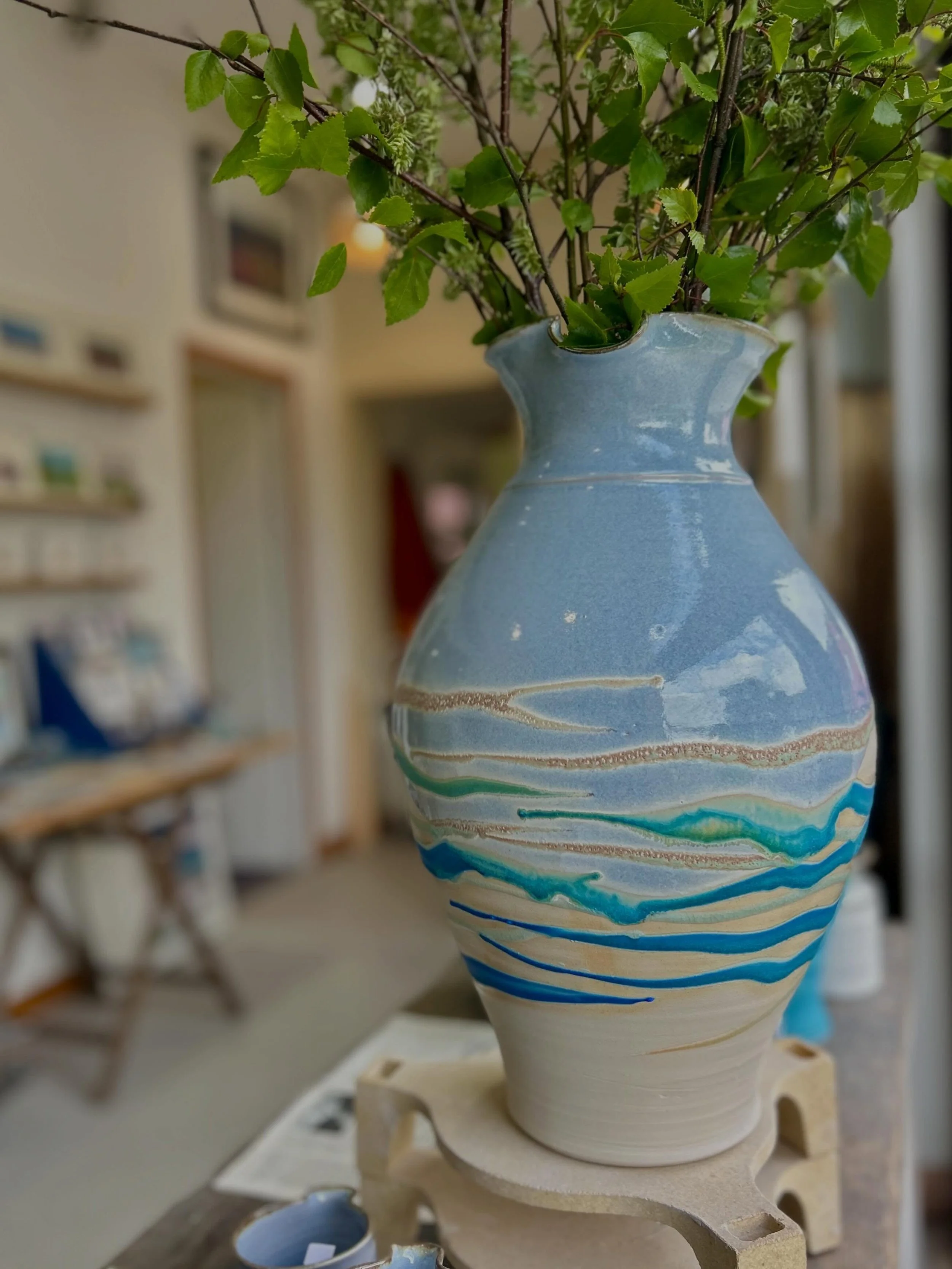 This beauty just came out of the kiln this morning, having waited patiently for several years to be glazed and fired.

This one was thrown by David Owen, who worked with us for a long time, and glazed by Rory. 

We may have to hold on to this one for