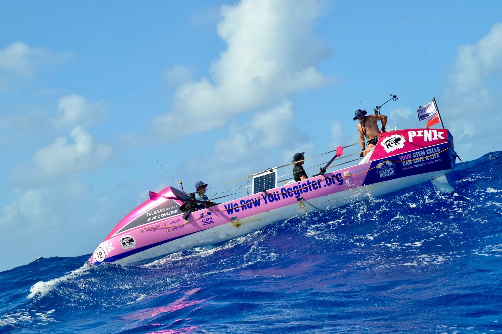 pink ocean rowing boar.jpeg