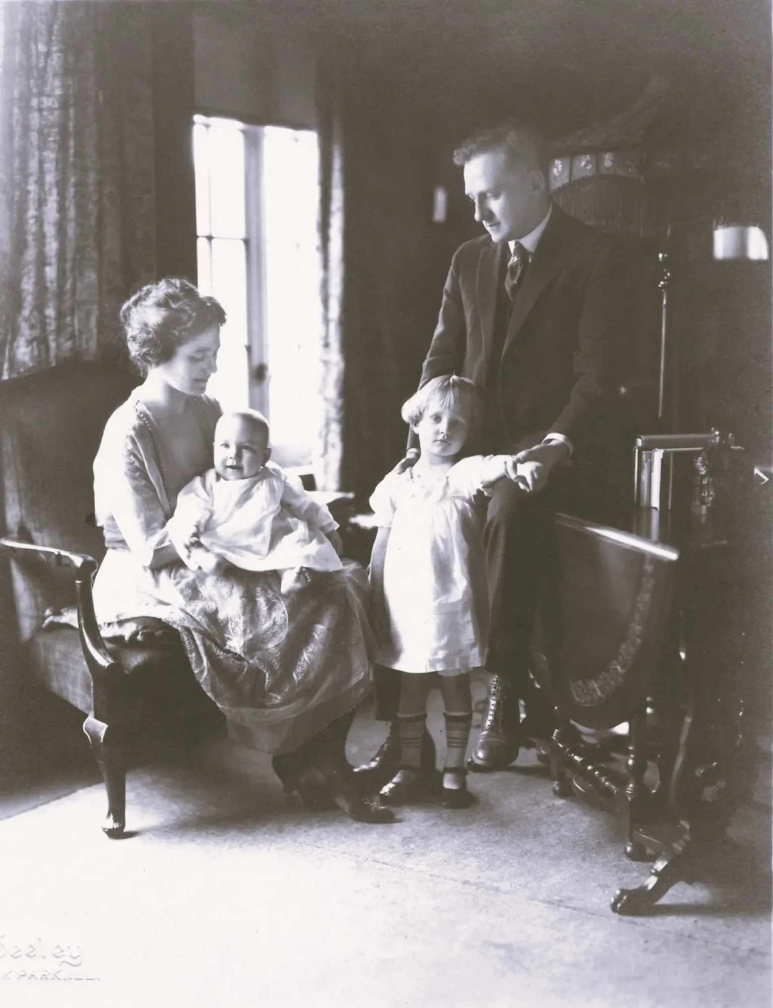 Helen Stein Johnson with her husband and their two young children, circa 1920.