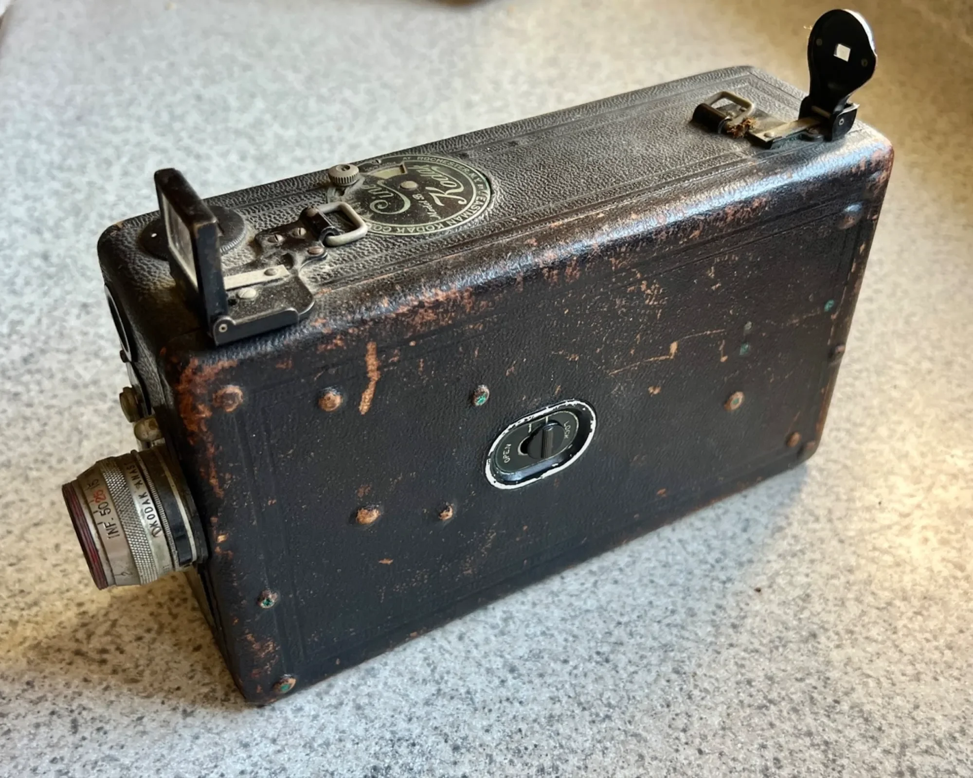 A side view of Helen's camera, a 1925 Cine-Kodak Model B.