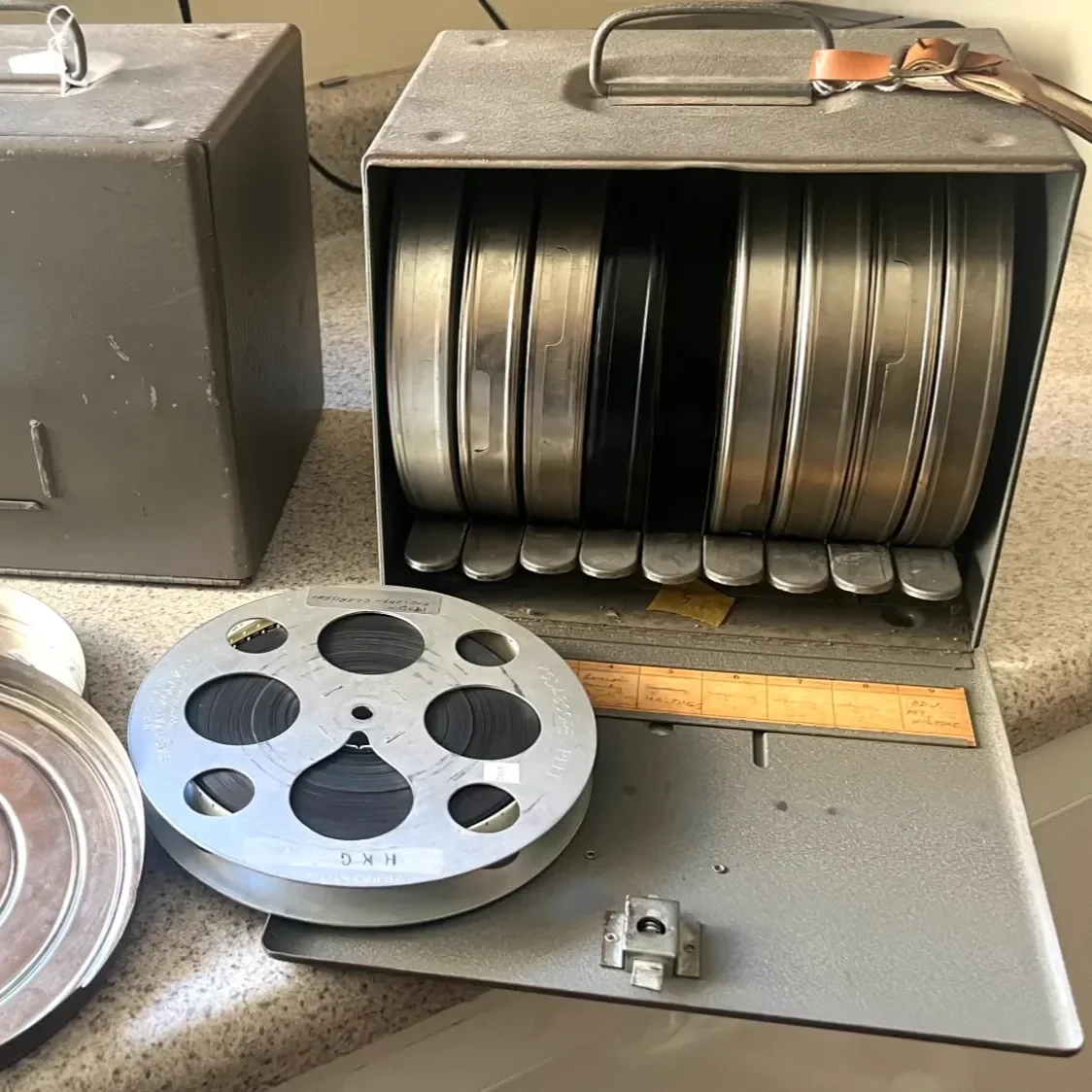 A box containing used film from the 1920's and '30s.