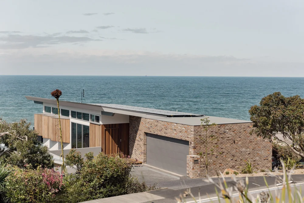 Split-level clifftop home at Wombarra with ocean views, a knockdown rebuild by CKS Projects