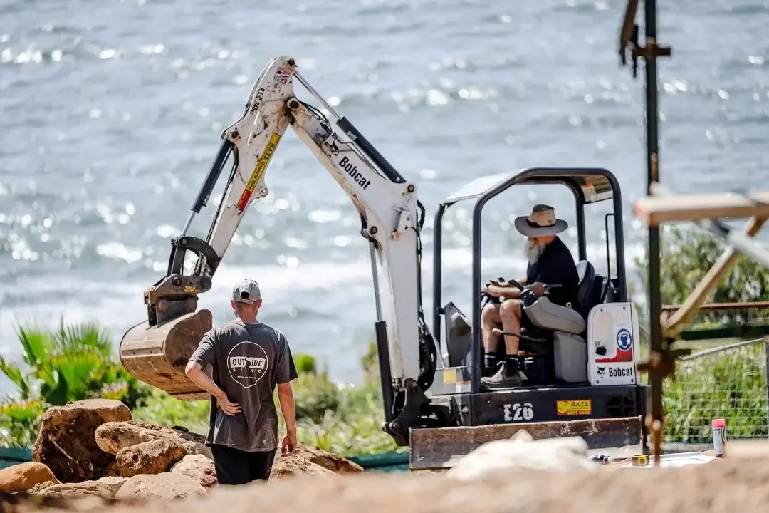 home building in a sloping block area