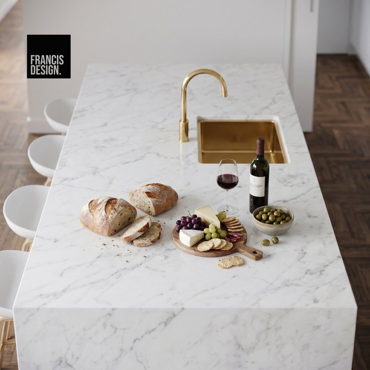 Marble-look island benchtop with brushed brass tapware and sink