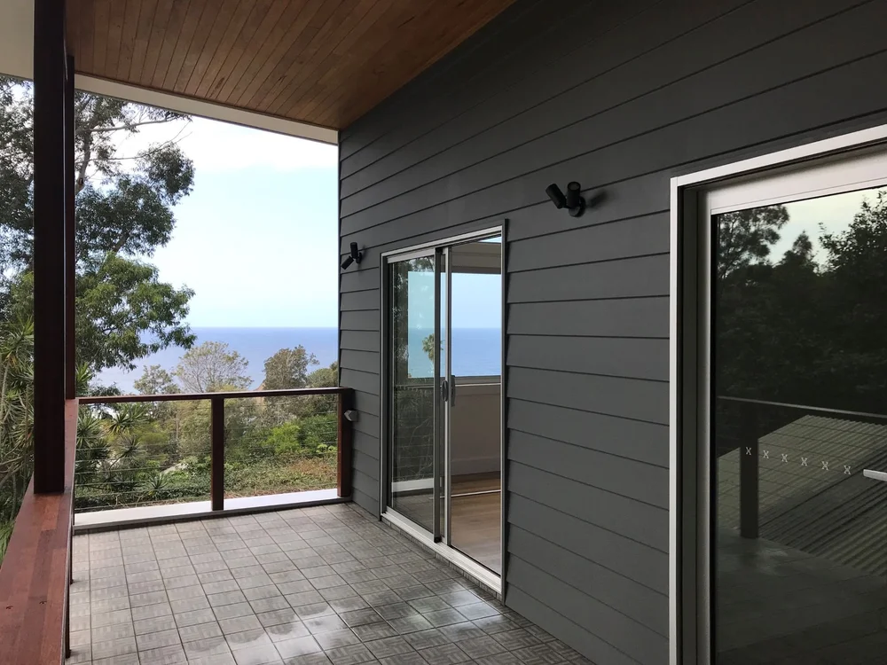 Upper-level balcony with ocean view on the Wombarra second-storey addition by CKS Projects