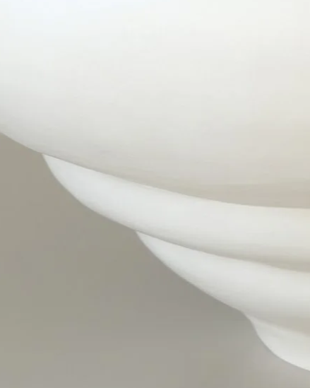 Close-up of a hand-coiled Ampla stoneware piece by SOIO Studio