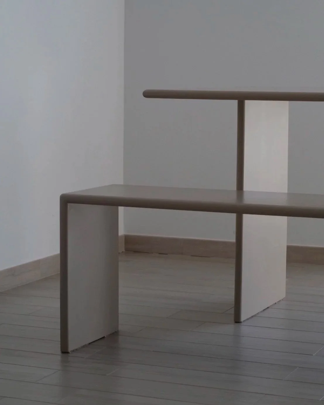 Belka iroko wood bench in a minimalist interior, by SOIO Studio